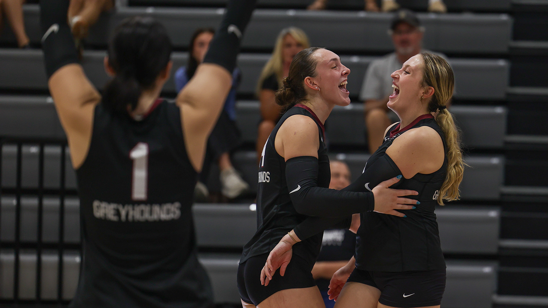 Riley Laine and Maddie Berger celebrate a point