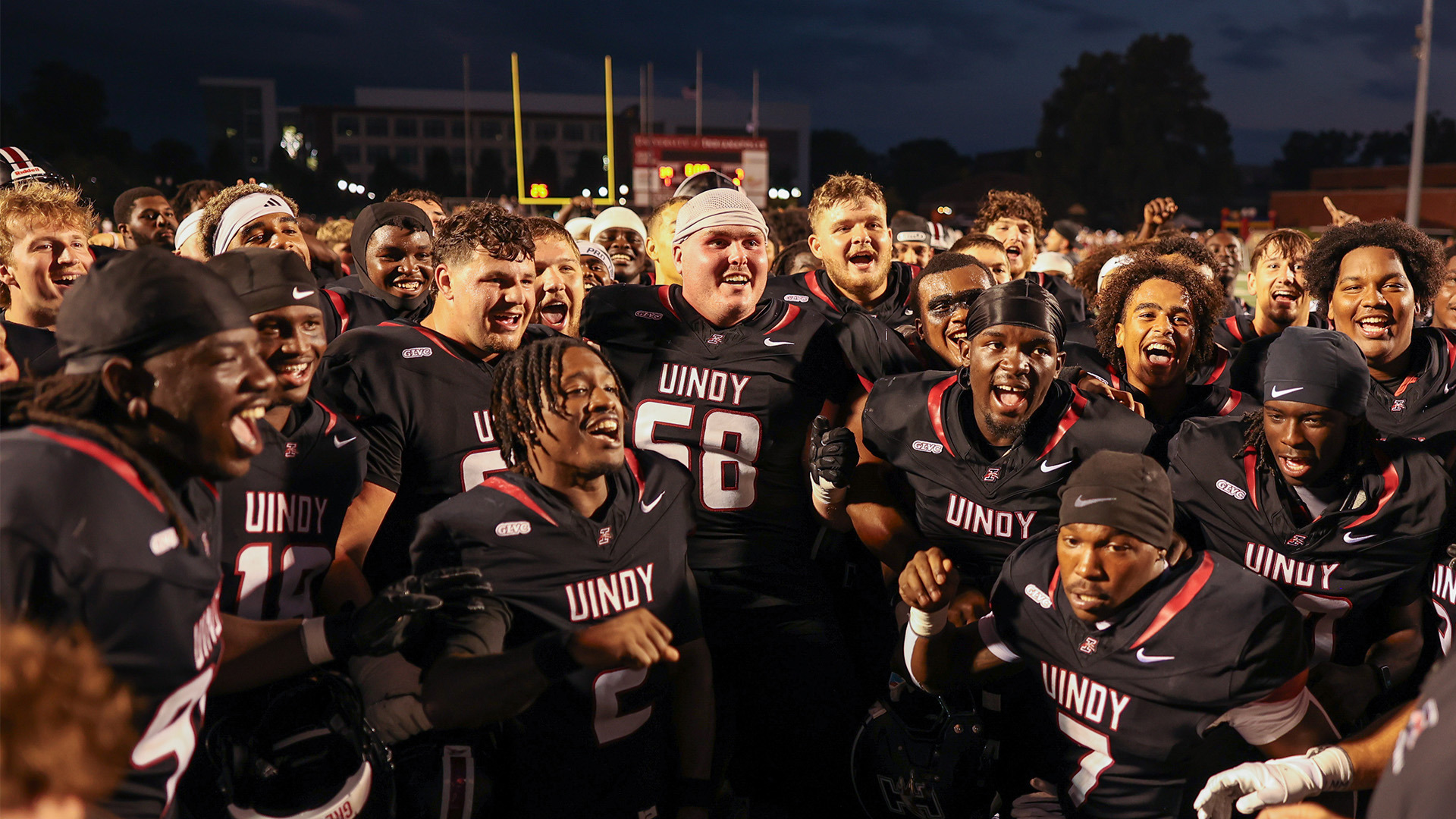 Member of the UIndy football team gather on the field after the team's 39-7 win over Marian on August 27, 2026.
