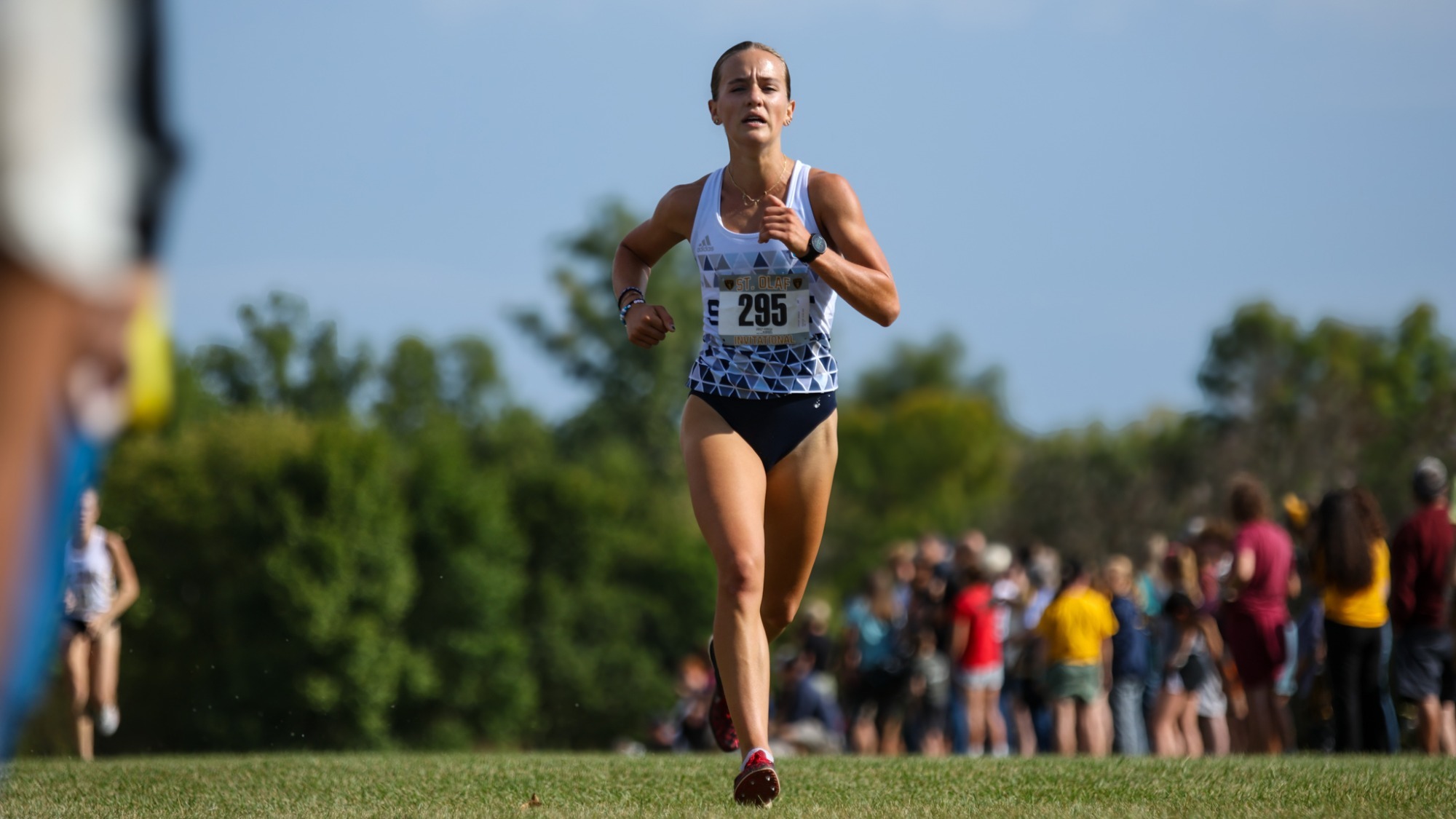 Brekkyn Lammert runs towards the finish