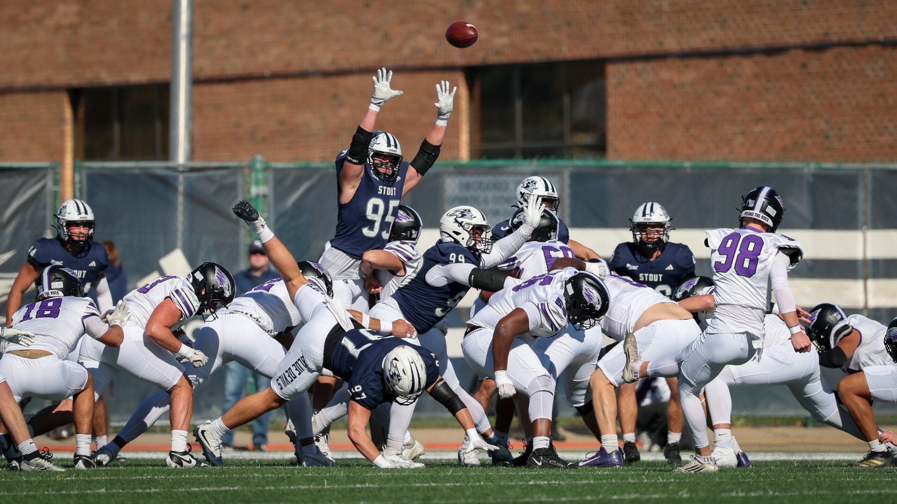walker beyerl gets up for a FG block