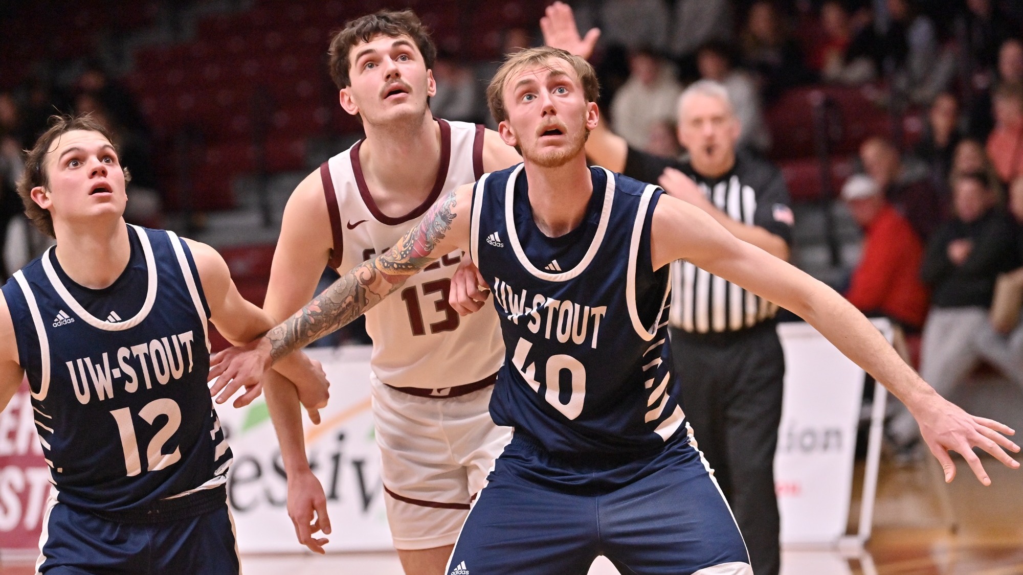 Aidan Shore Boxes Out UWL player