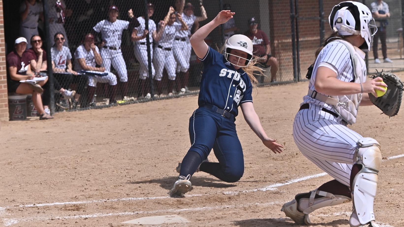 Elly Holden slides in safely at UWL
