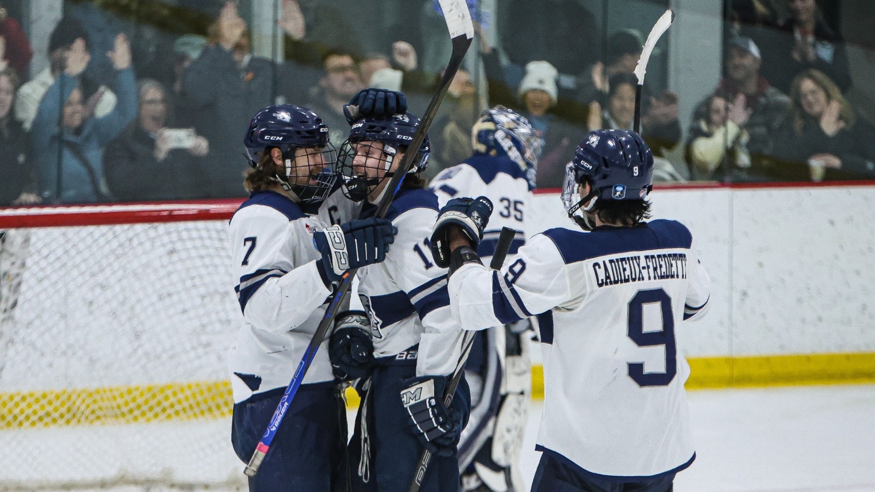The Blue Devils celebrate an empty net goal