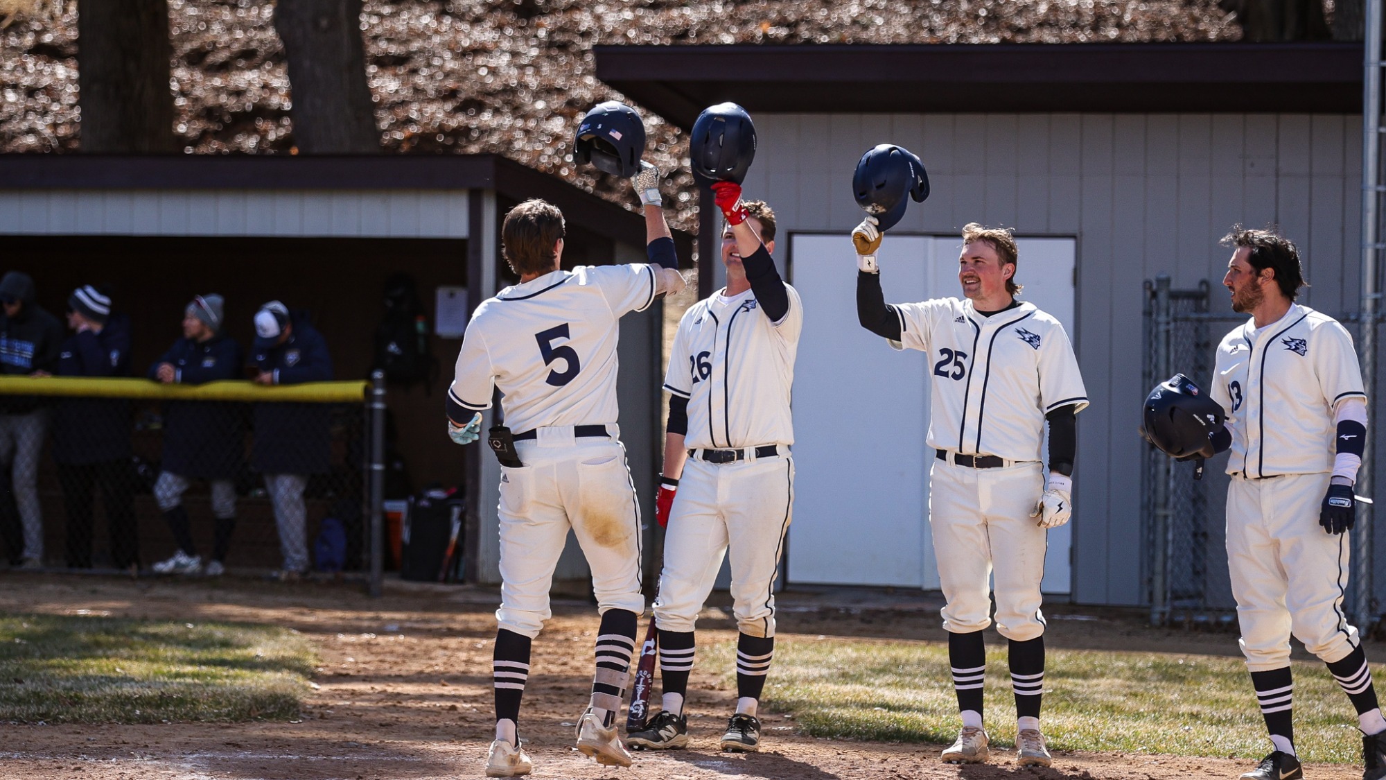 Gavyn Schacher celebrates home run with teammates