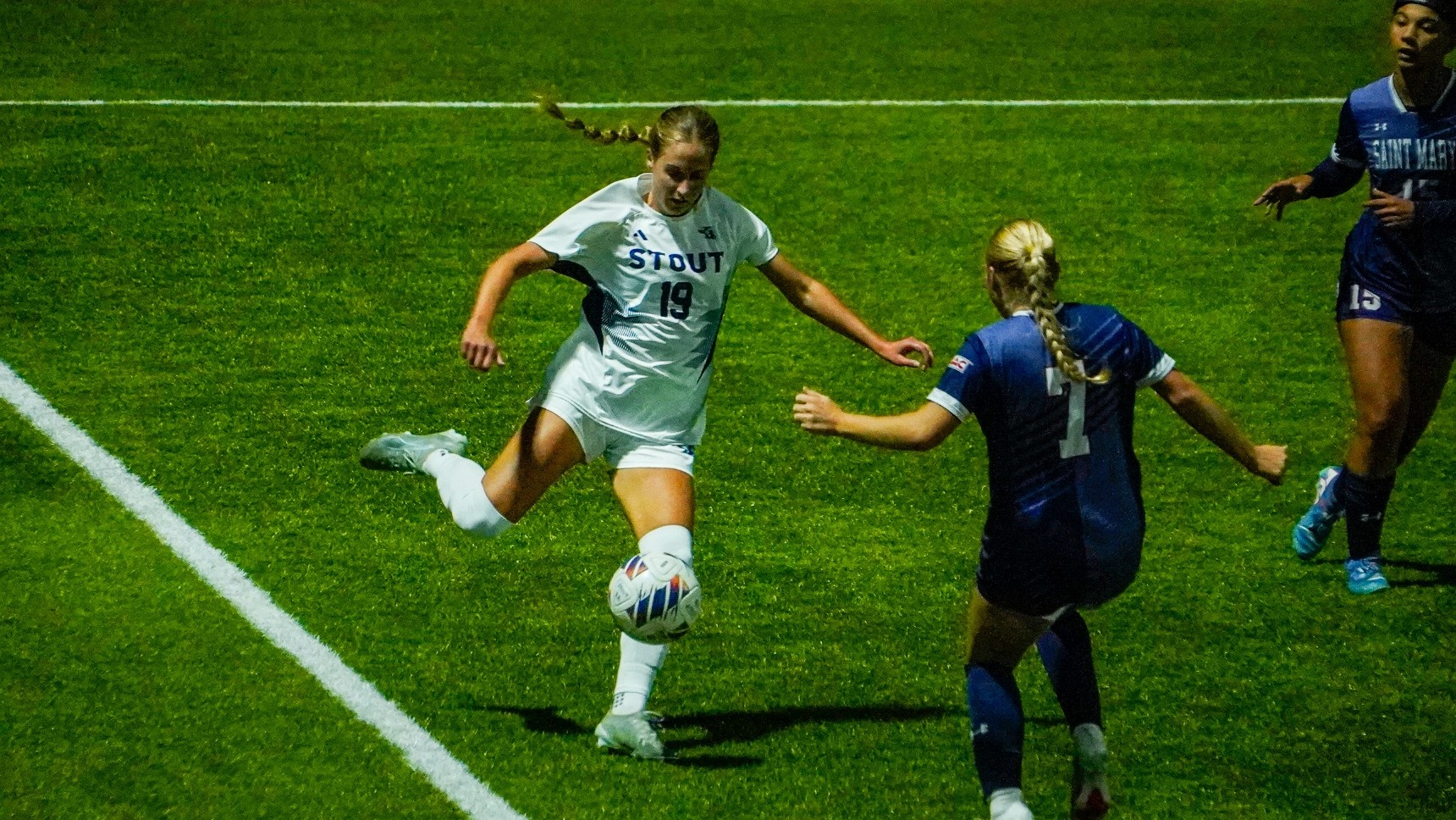 Tia clears the ball