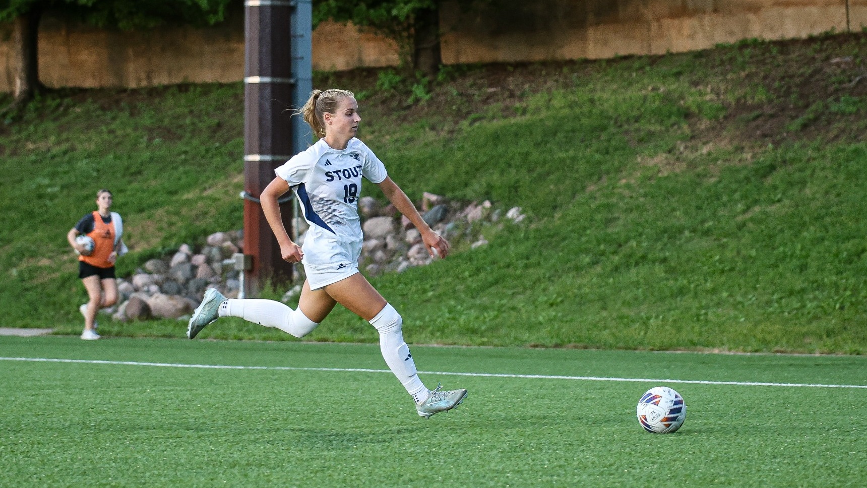Tia Rubow chases down the ball