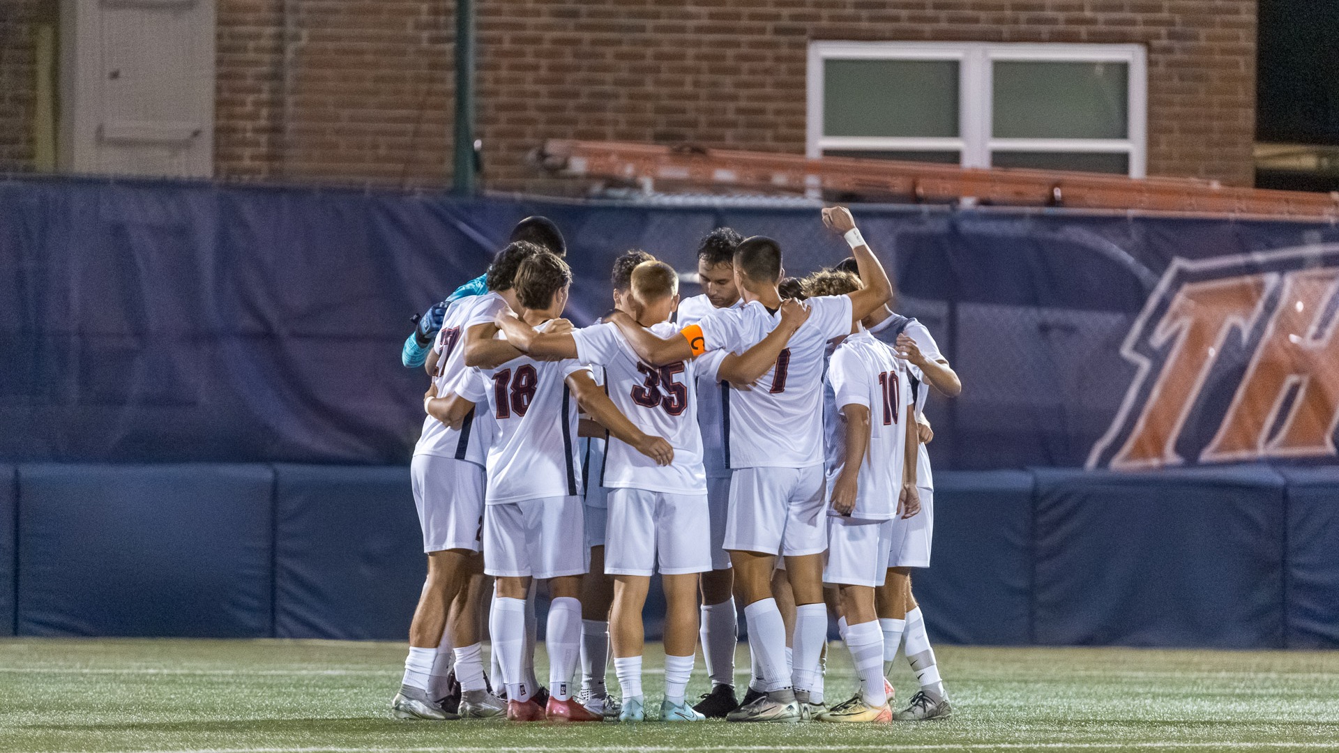 Men's Soccer team huddle