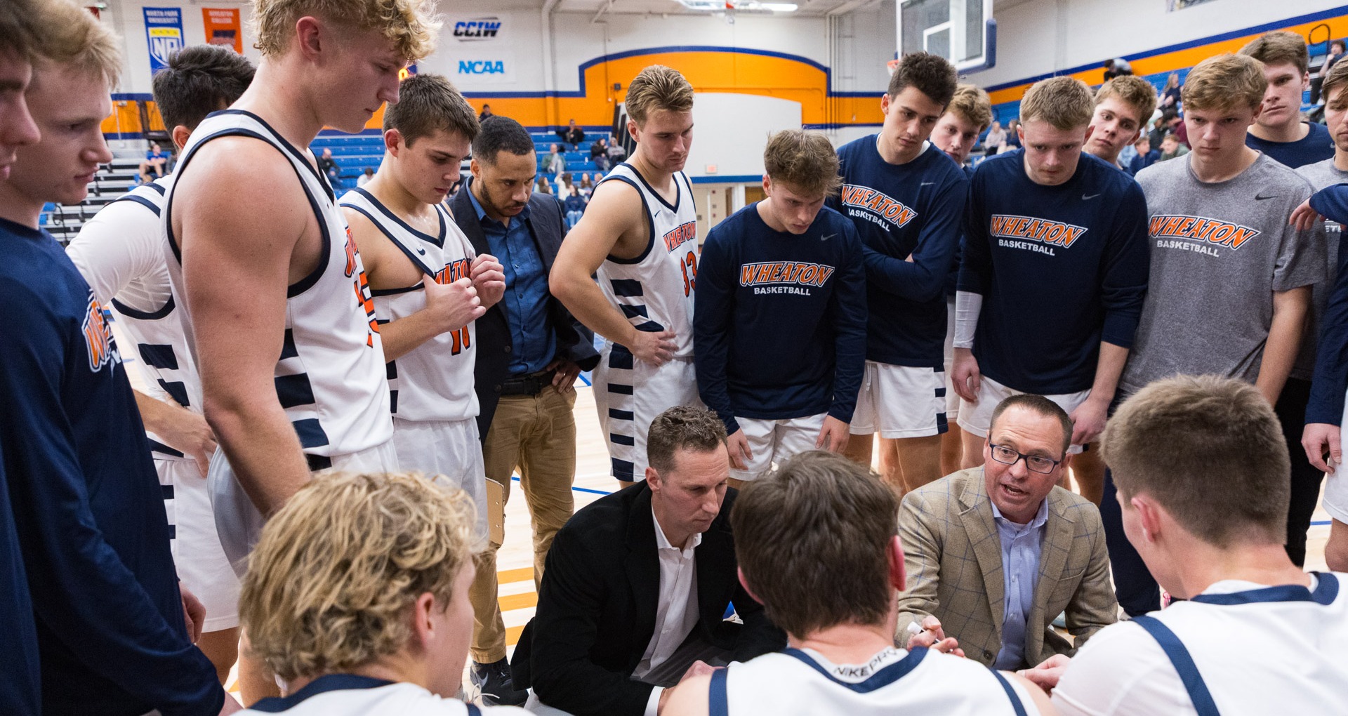 Men's Basketball huddle