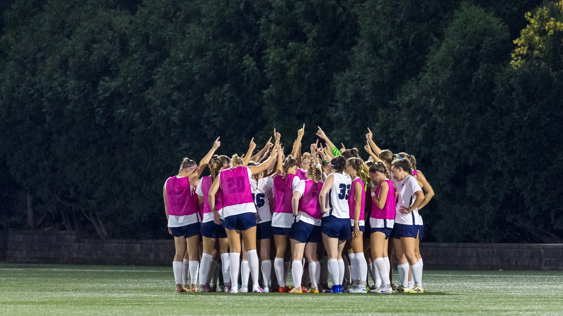 Women's Soccer team huddle