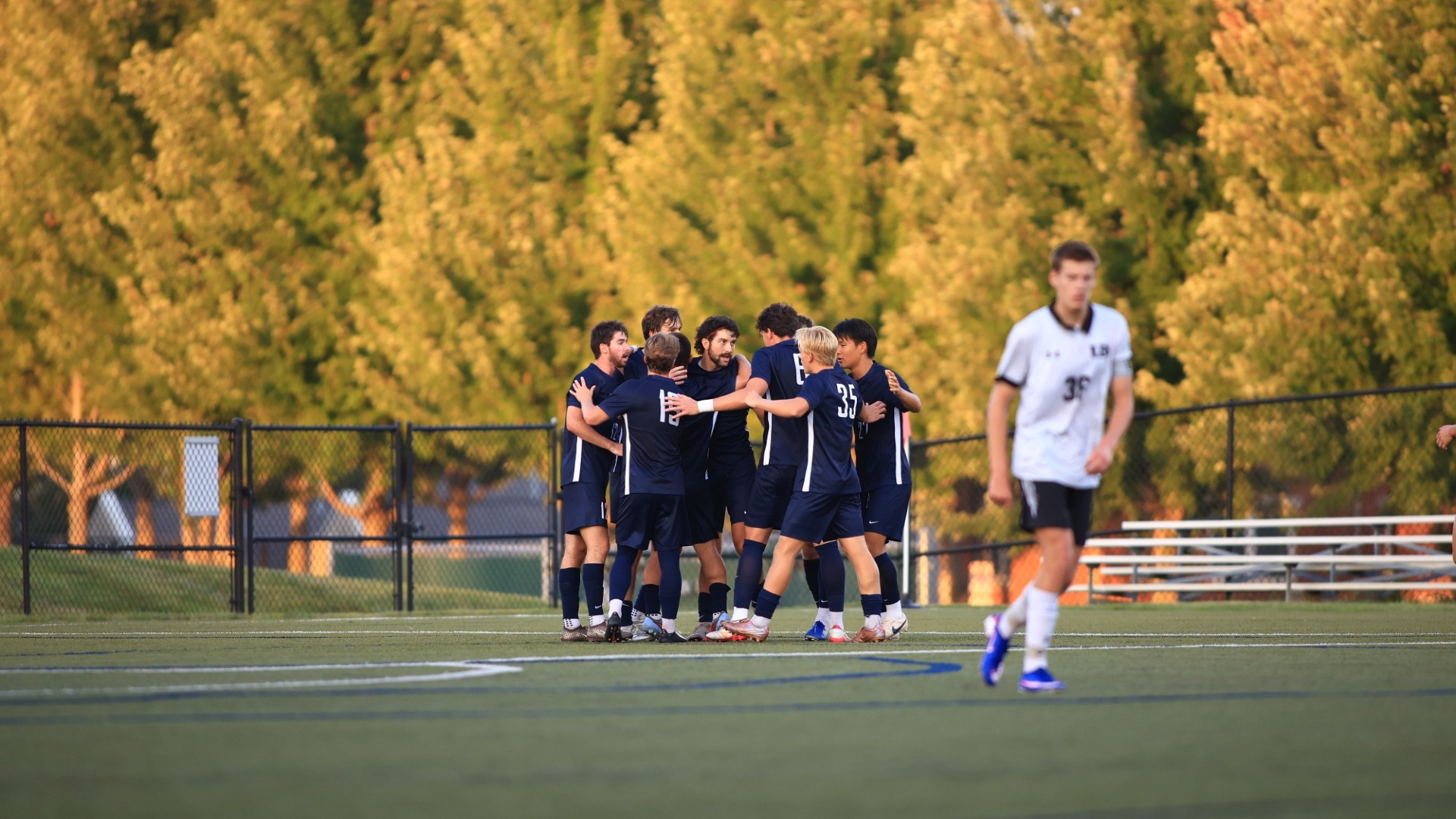 Men's Soccer huddle celebration