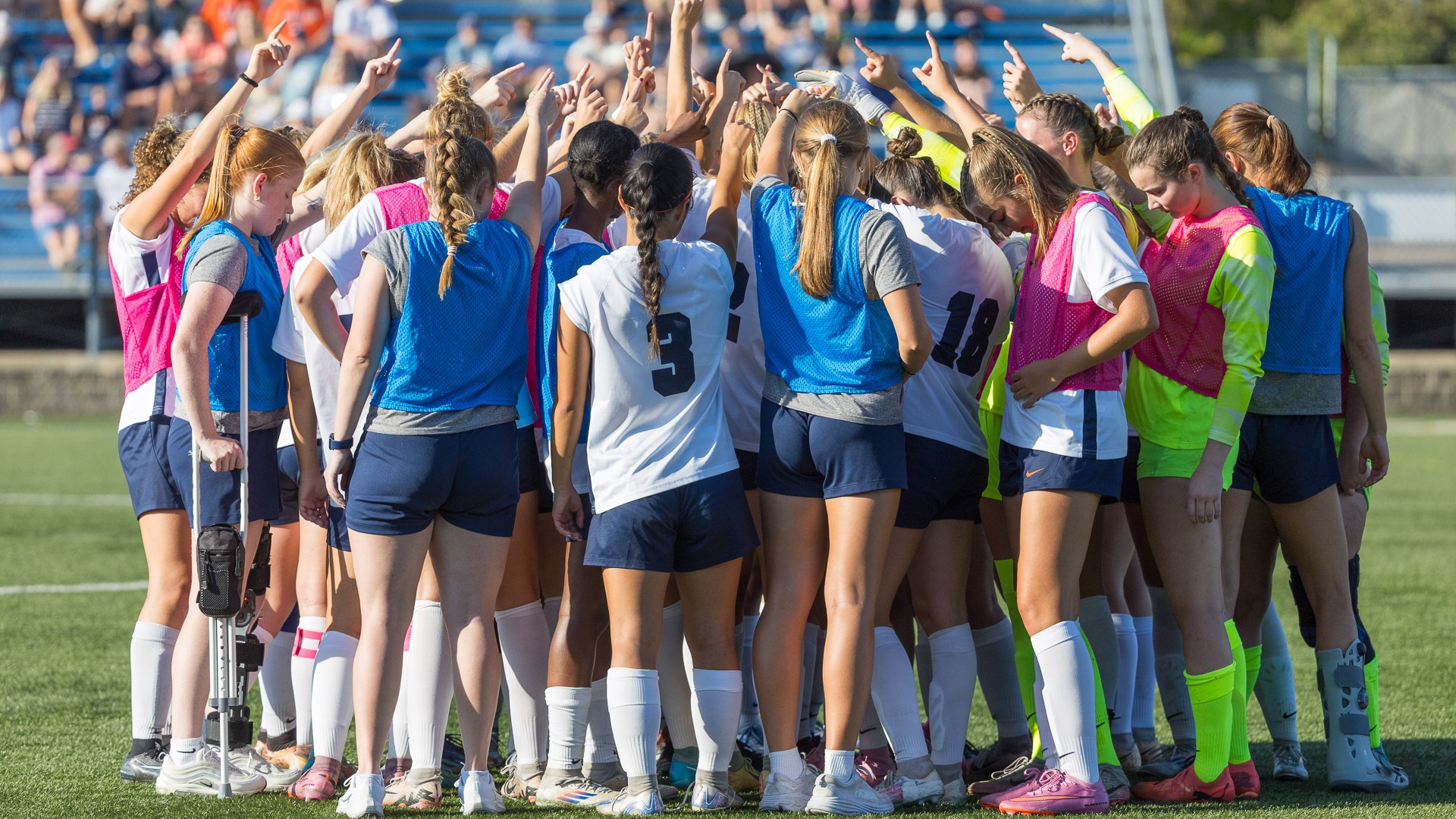 Women's Soccer team huddle