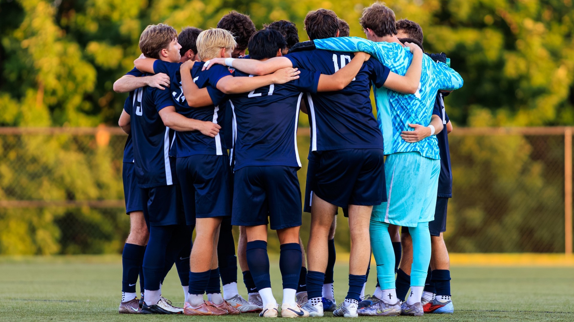 Men's Soccer huddle
