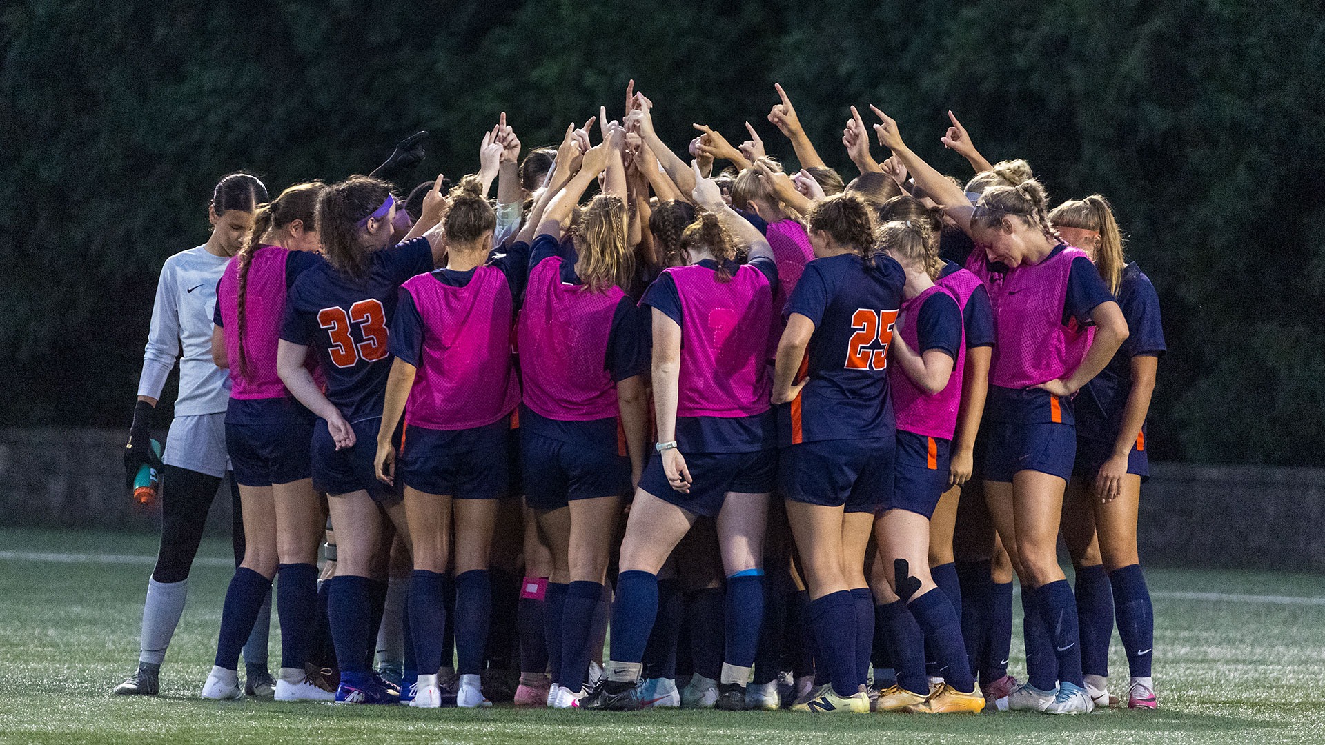 Women's Soccer team huddle
