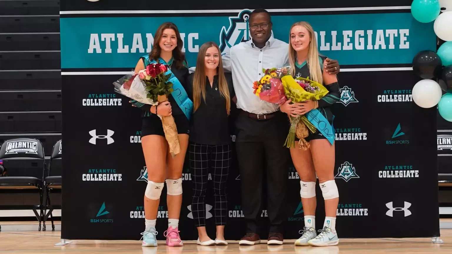 Reese Feldman (L), coach Catrina Edwards, Coach Larry Church and Ella Handley