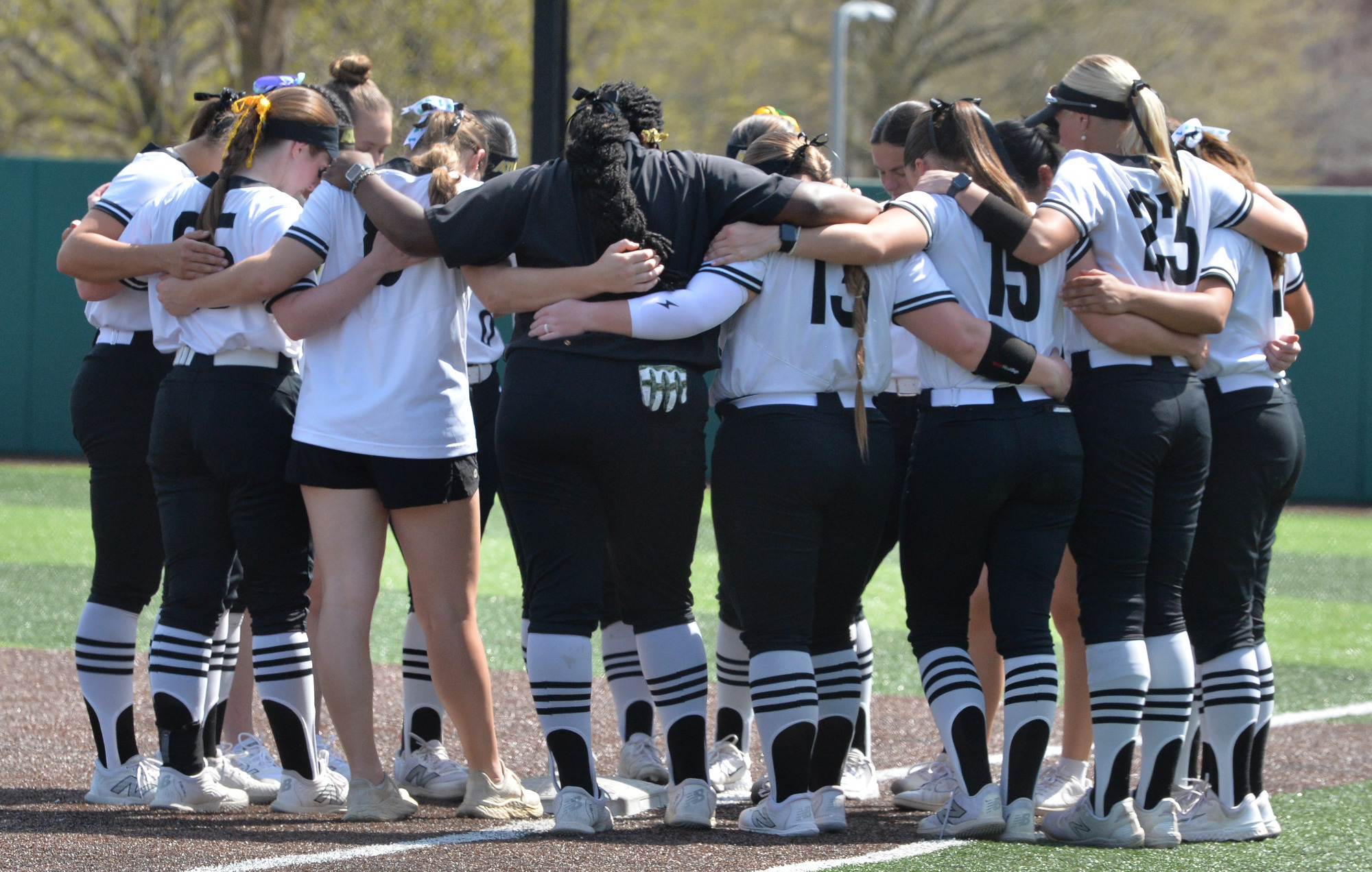 Softball team huddle