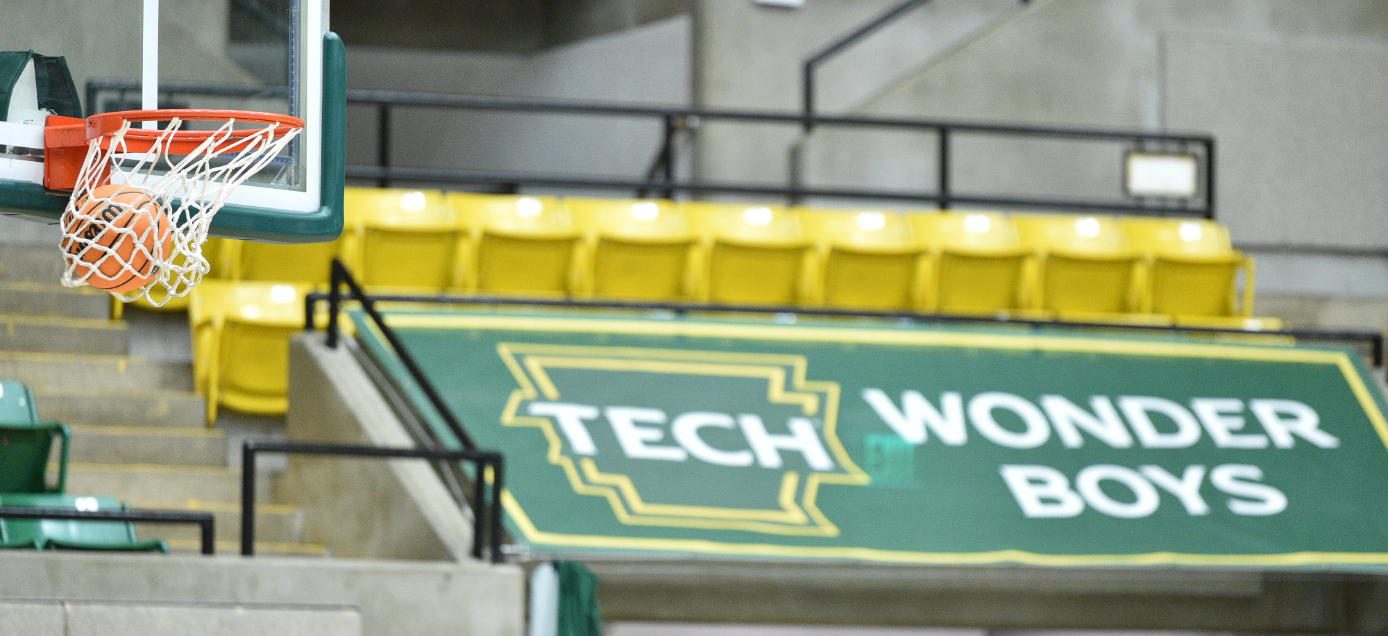 ball through hoop with Wonder Boys in background
