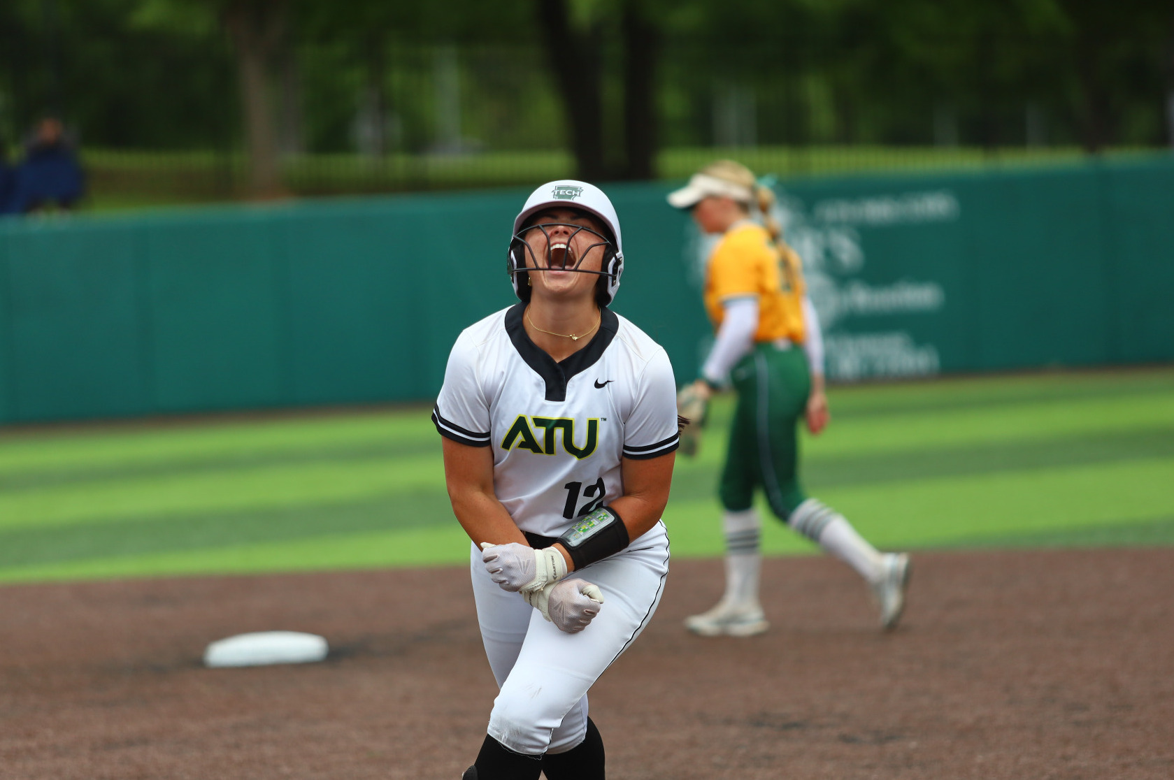 Caroline Wilhelm celebrating walk-off hit vs. Oklahoma Baptist