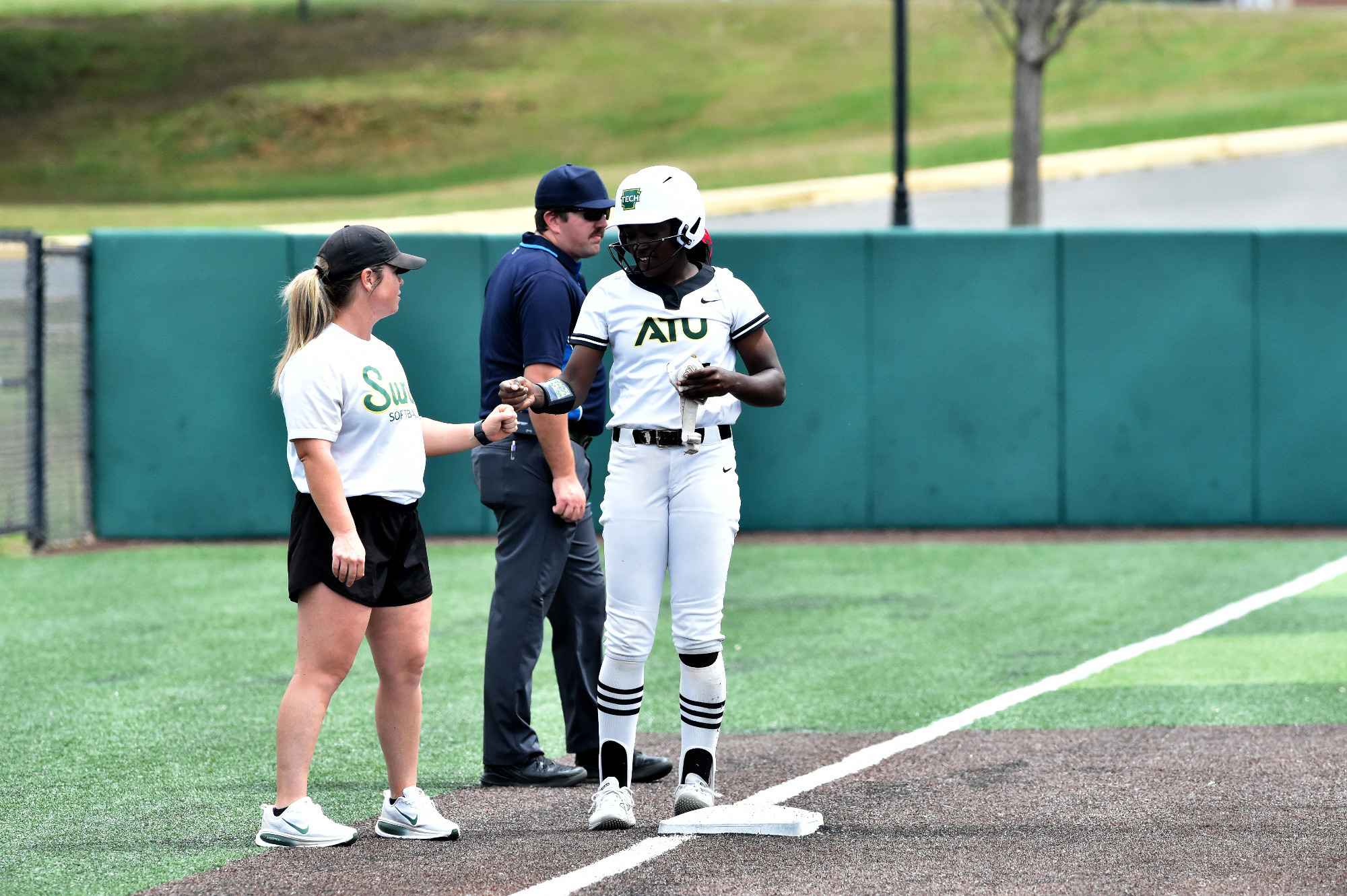 Aaliyah Dixon and Coach Jones at third