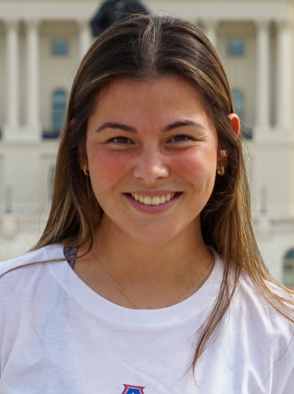 A headshot of Jo Torres, the lacrosse assistant coach, down at the Capitol building. 