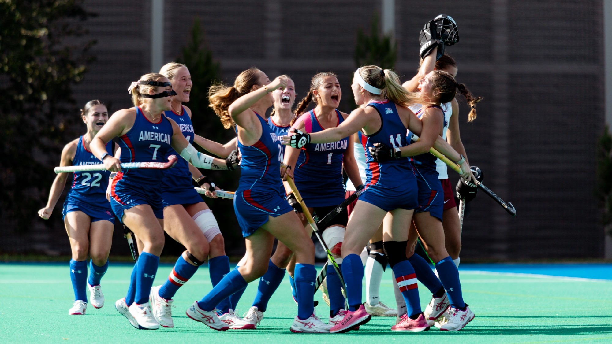 Field Hockey celebrates on the field after scoring its third goal against Lafayette.