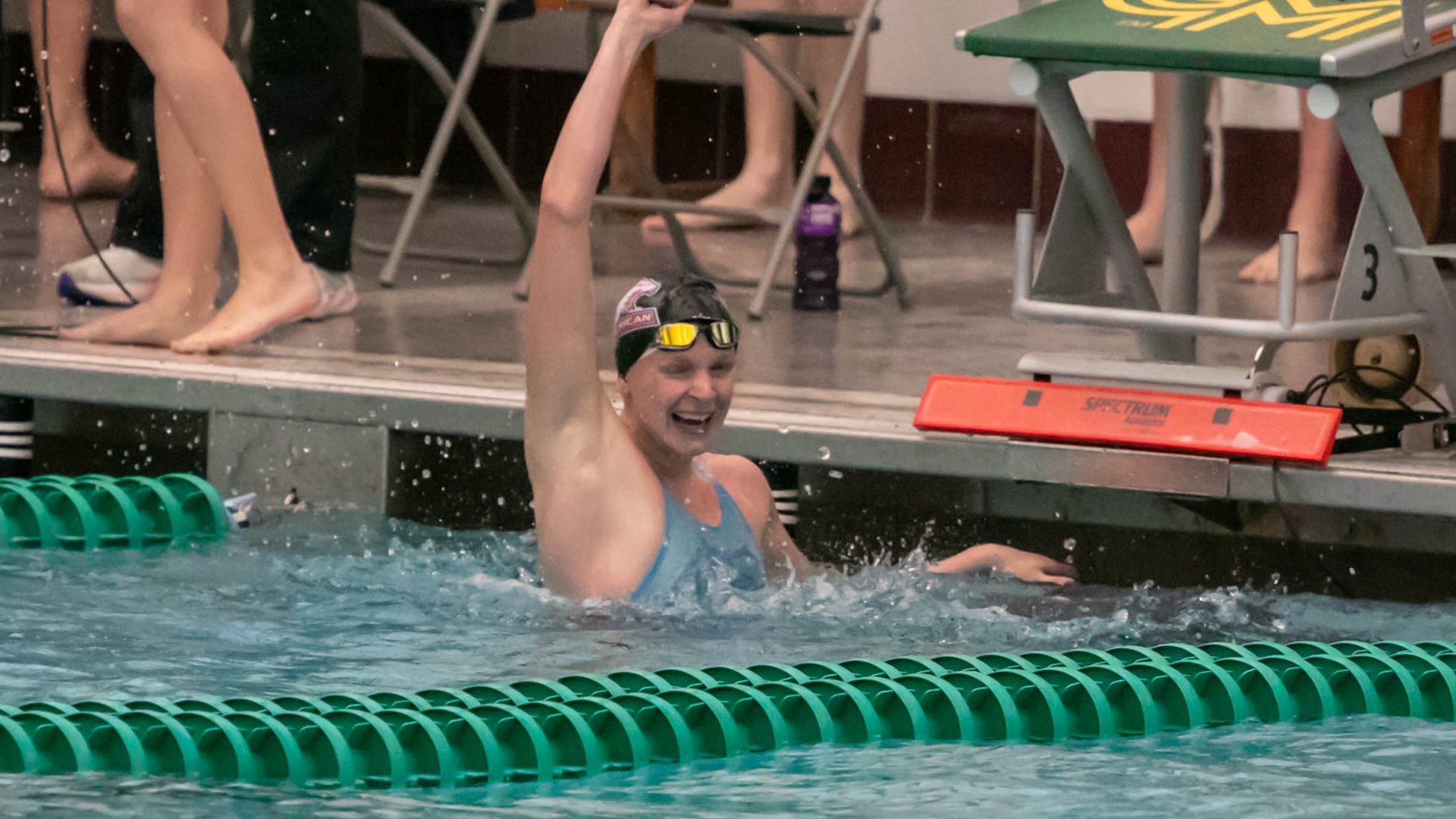 Piper Crosby celebrating after a swim race