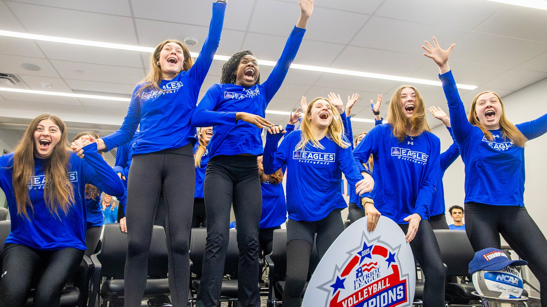 The volleyball team celebrating its selection to the NCAA Tournament.