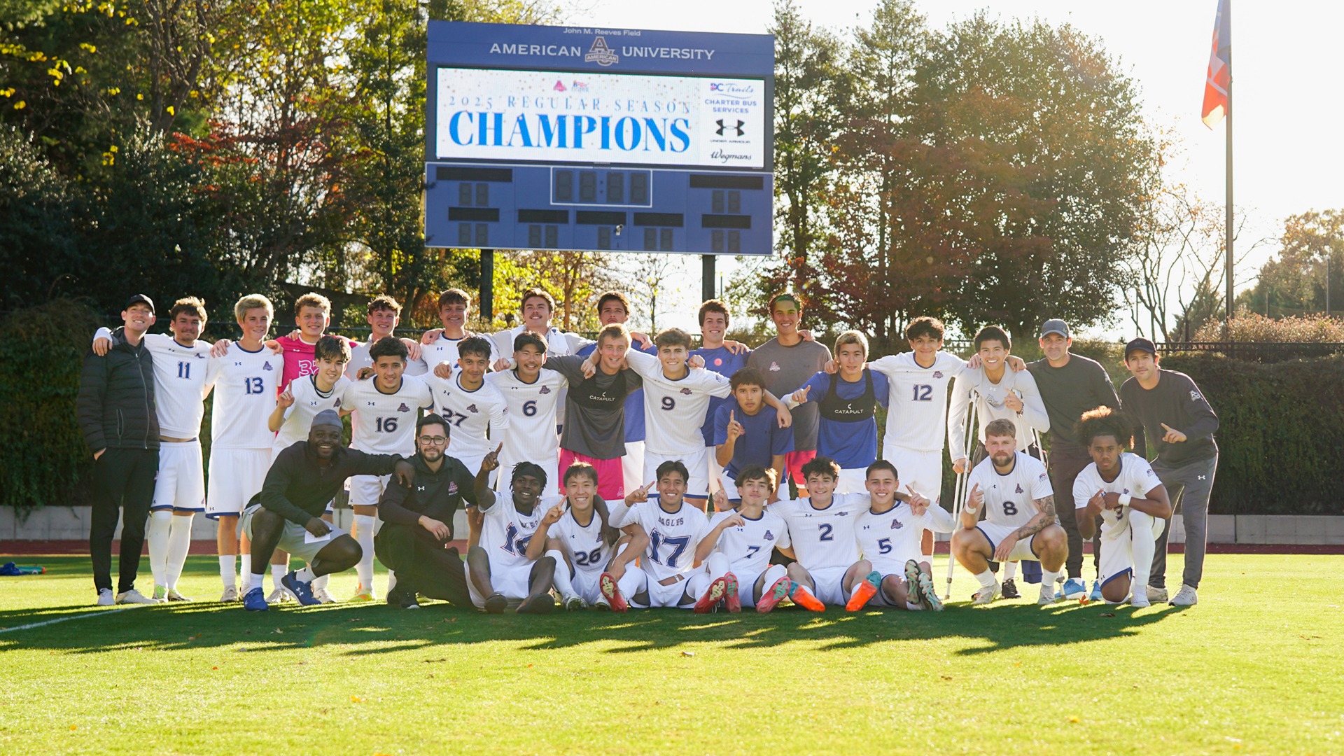 The 2025 men's soccer team celebrating the regular season Patriot League title at Reeves Field.