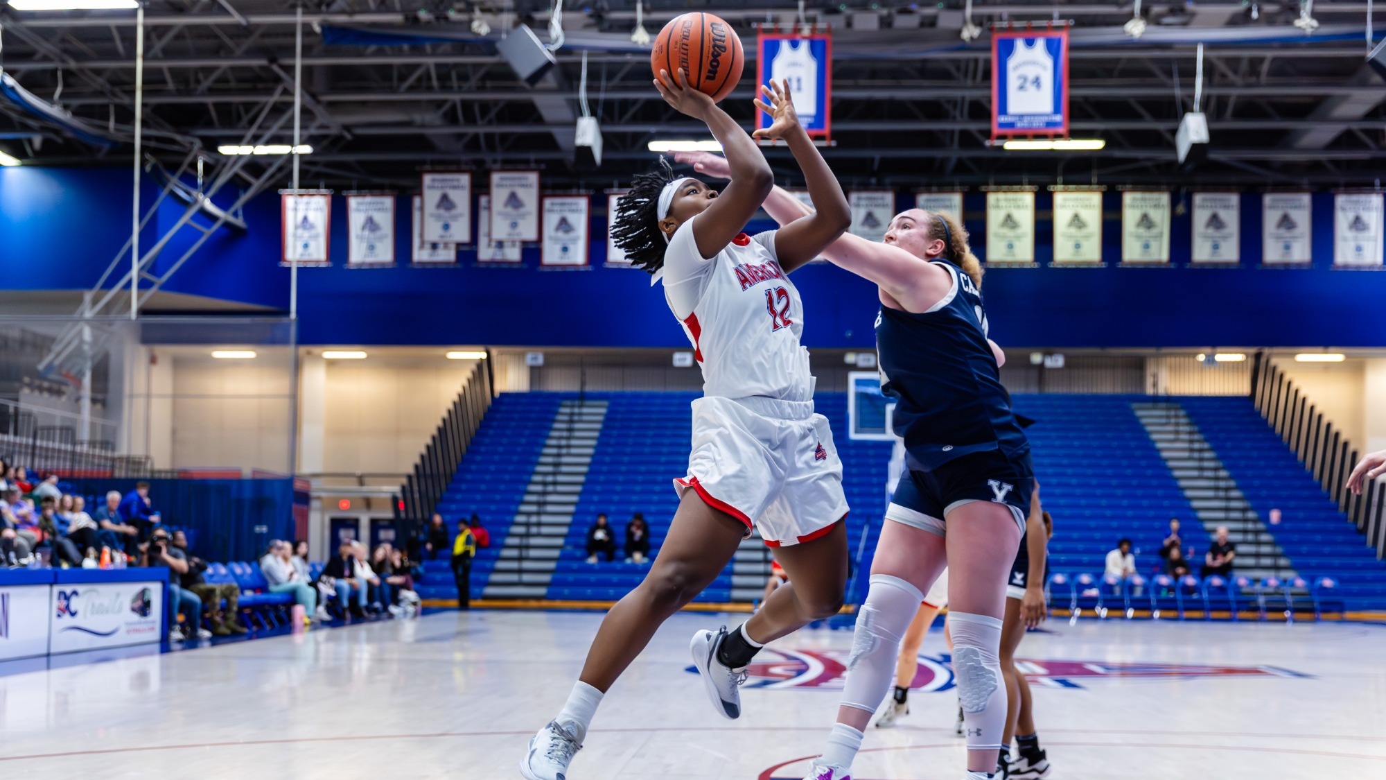 Madisyn Moore-Nicholson going for a layup against Yale in Bender Arena.