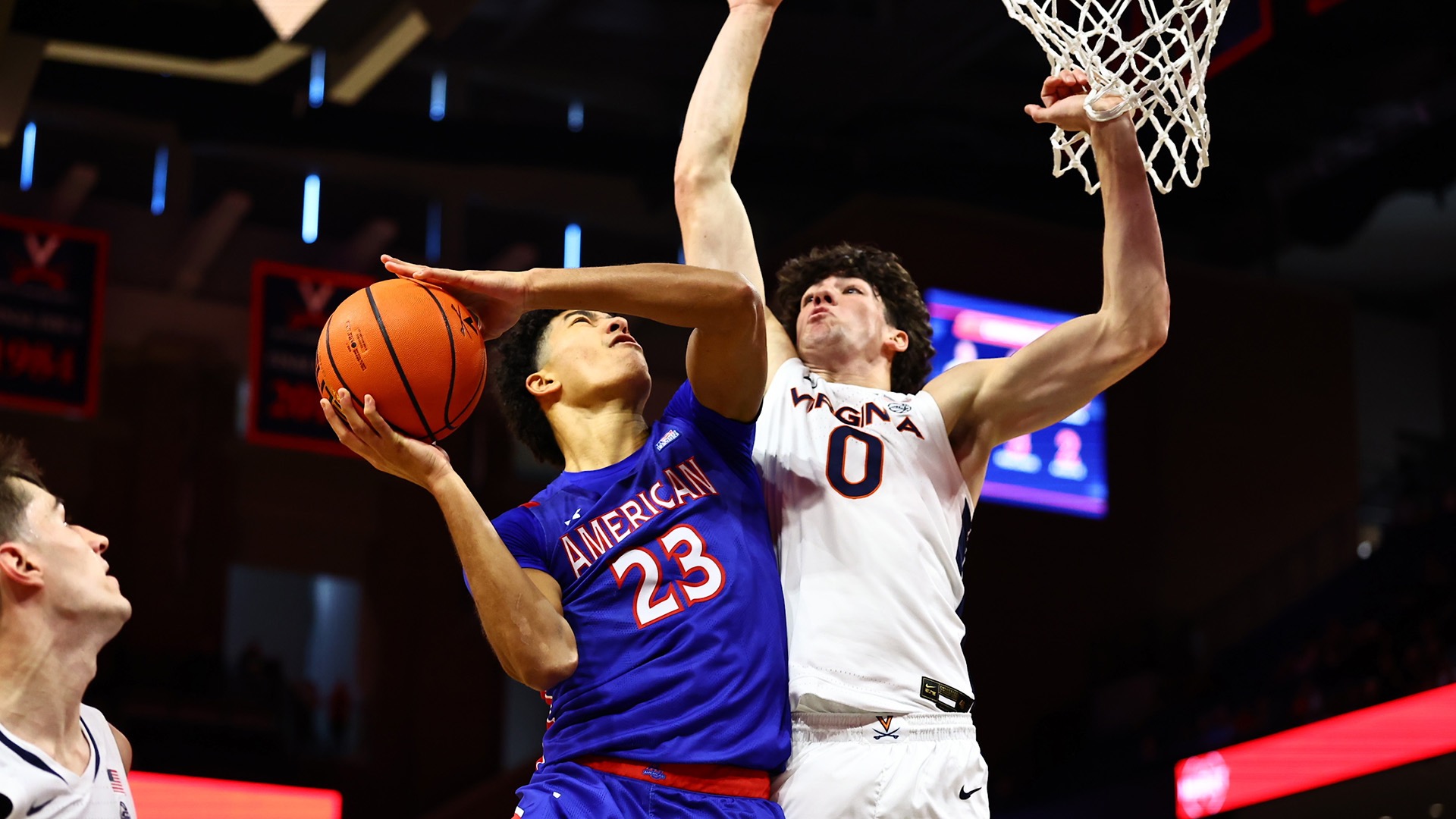 Greg Jones taking a shot in a men's basketball game at Virginia