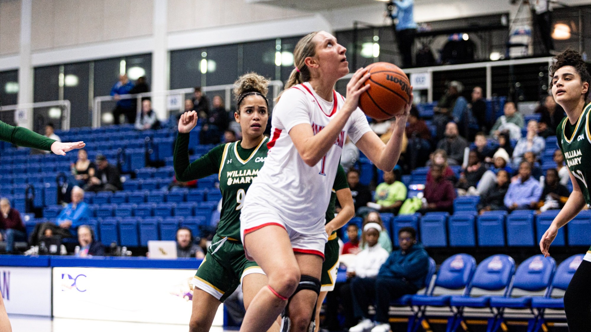 Anna Rescifina driving to the basket in Bender against William & Mary. 