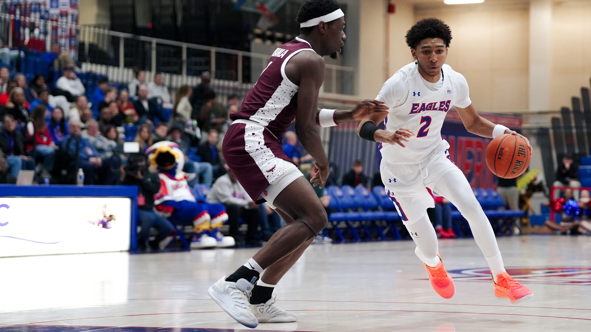 Madden Collins dribbling the ball in a men's basketball game against UMES on December 6, 2025