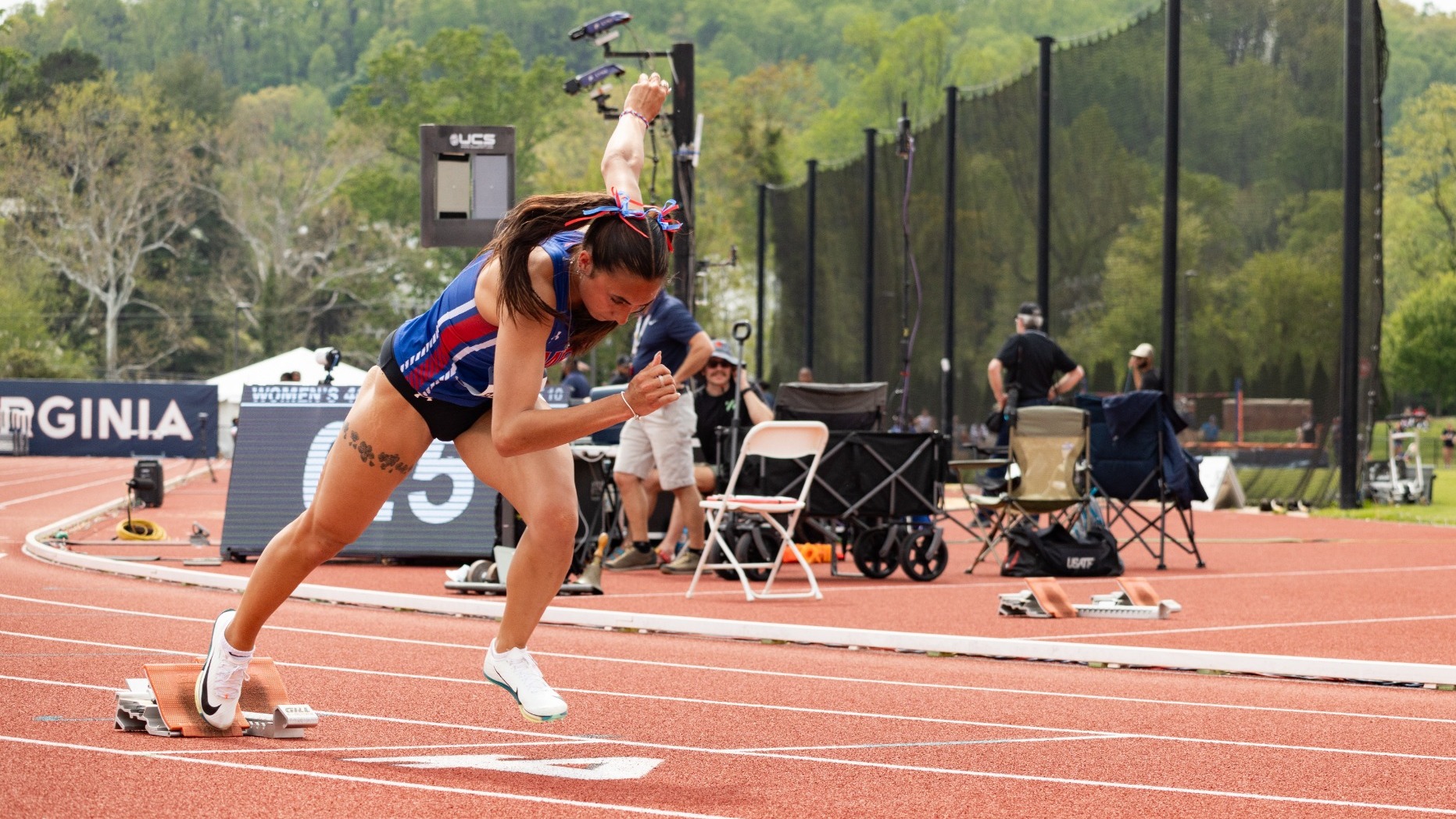 Lorelei Bangit practicing on the starting blocks at George Mason