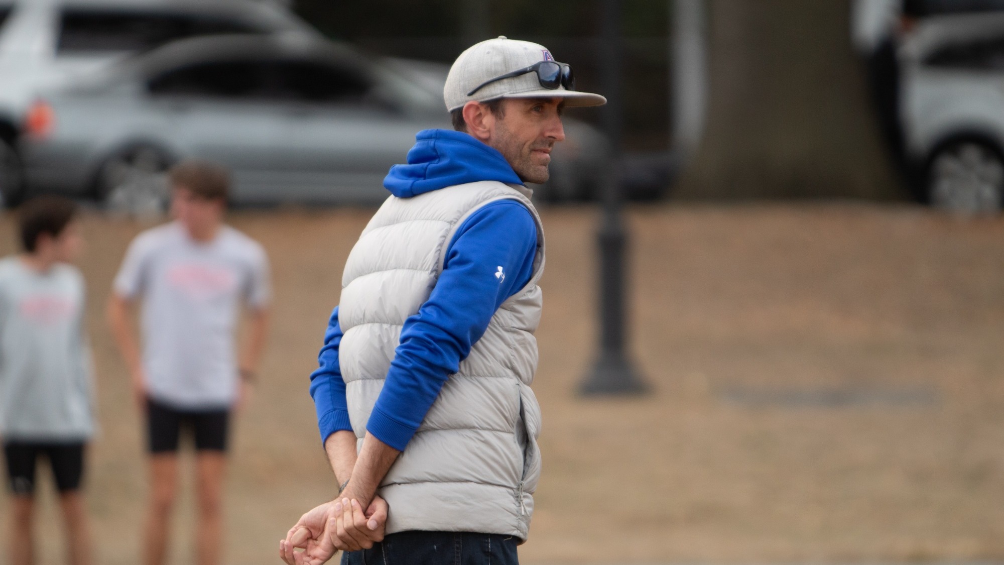 Sean Graham watching over athletes before a race.