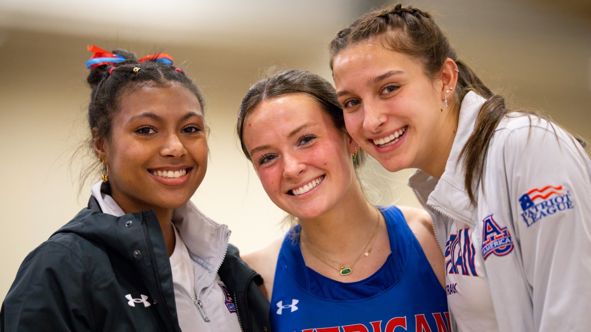 Zoe Clark, Darcy Scheiner, and Lara Gin smile for a picture