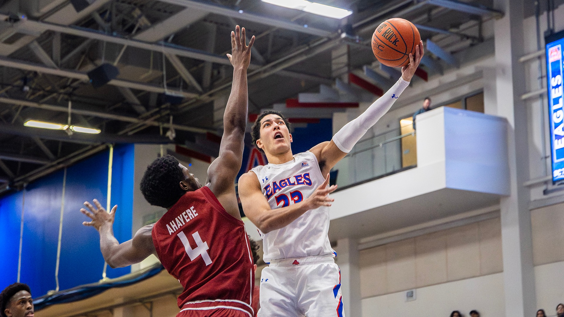 Greg Jones taking a shot in a men's basketball game against Colgate