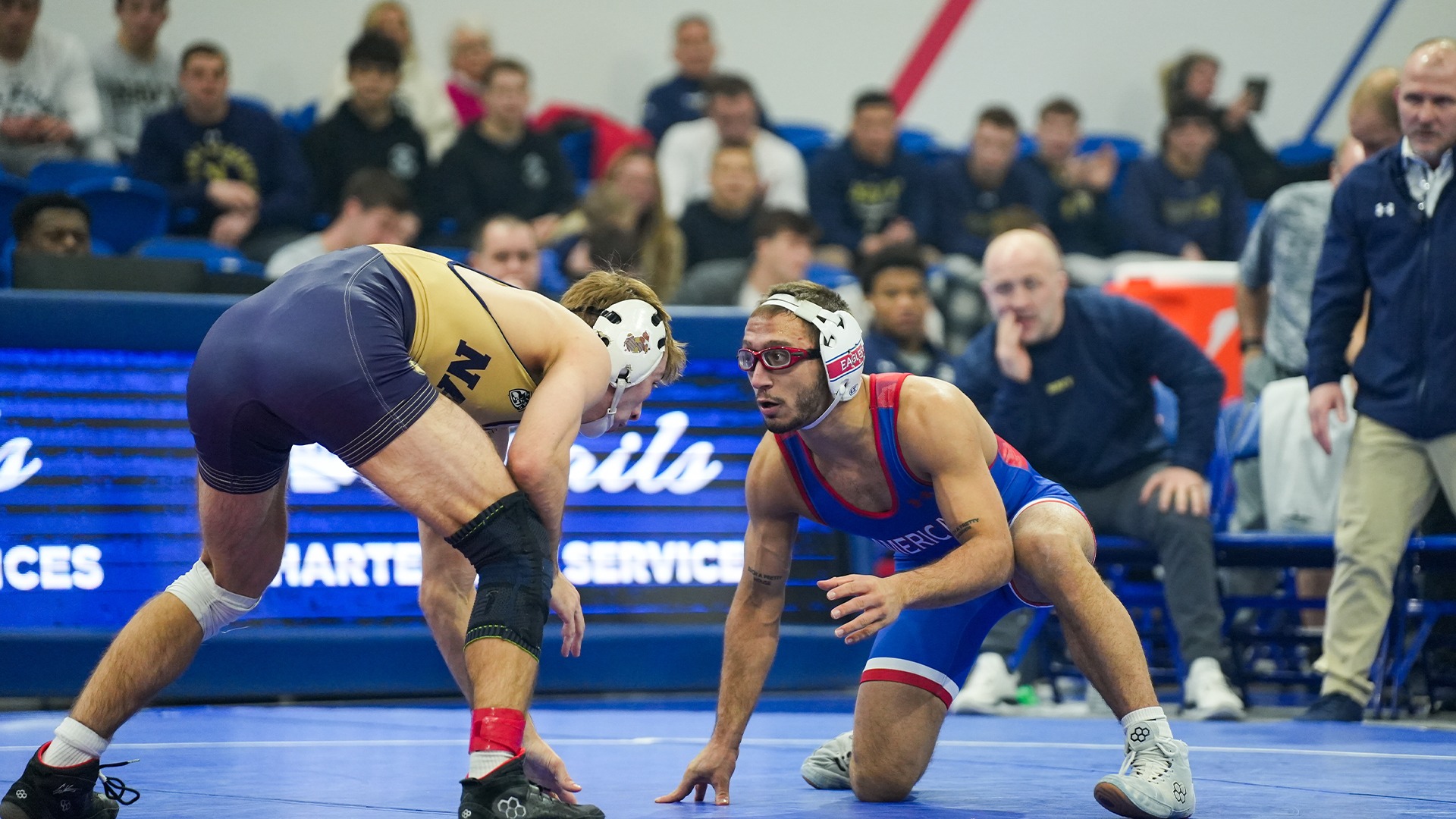 Maximilian Leete wrestling in a match against Navy.