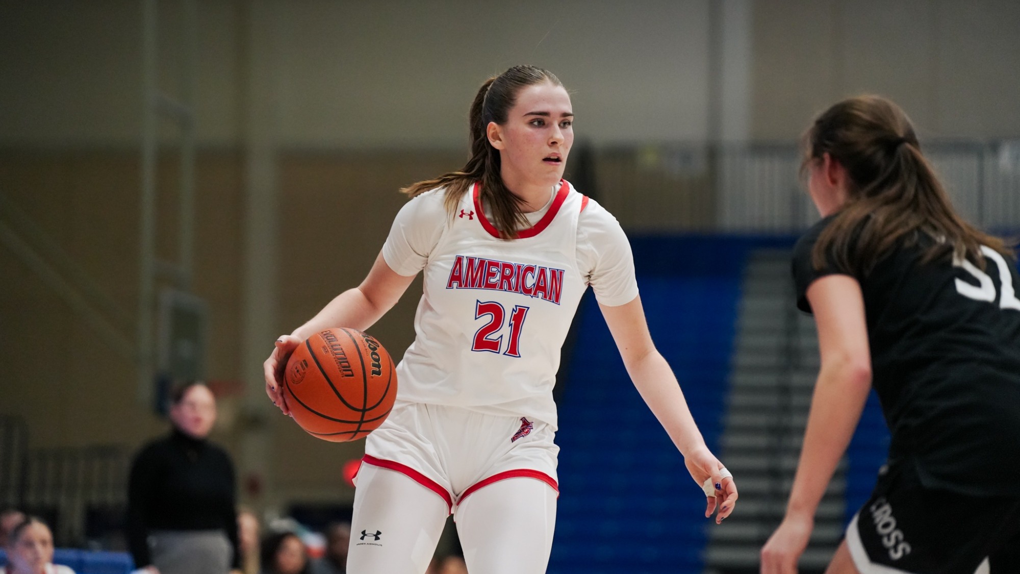 Charlotte Tuhy making a play against the defense against Holy Cross.