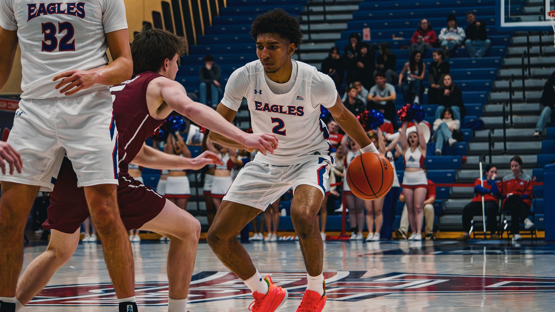 Madden Collins with the ball during a men's basketball game against Colgate
