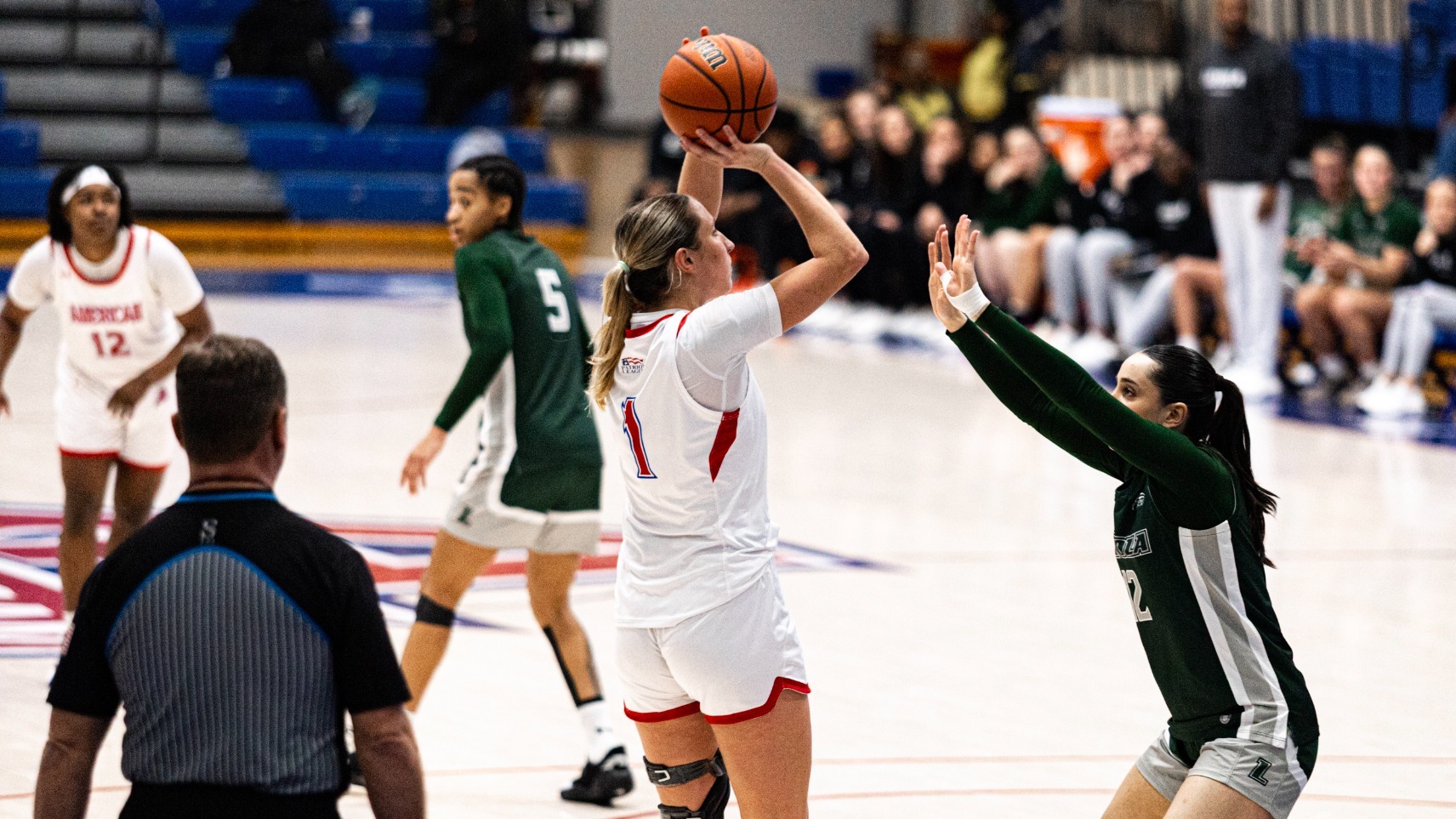Anna Rescifina taking a mid range jump shot over the Loyola defense.