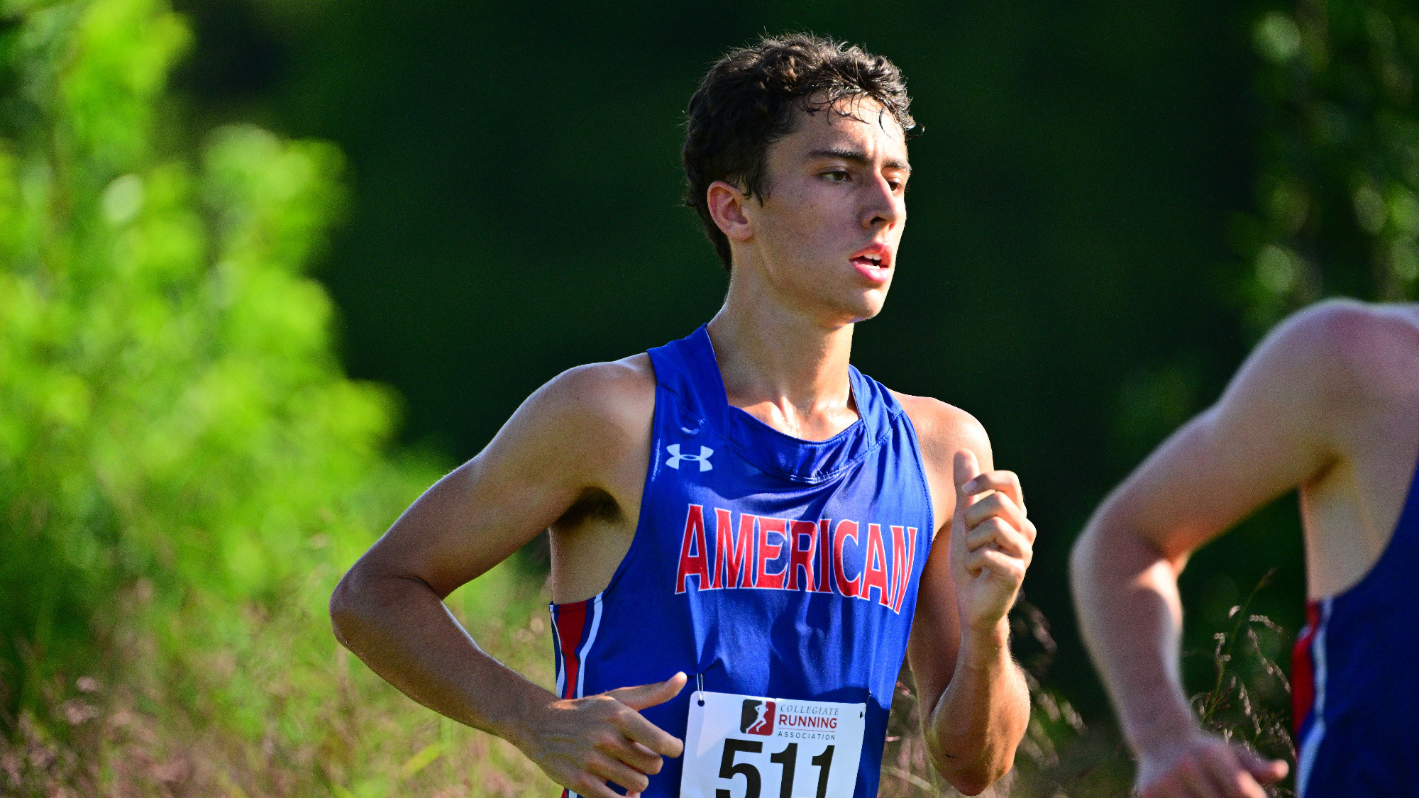 Marcus Valenzuela running in the Spider Alumni Open meet in Richmond.