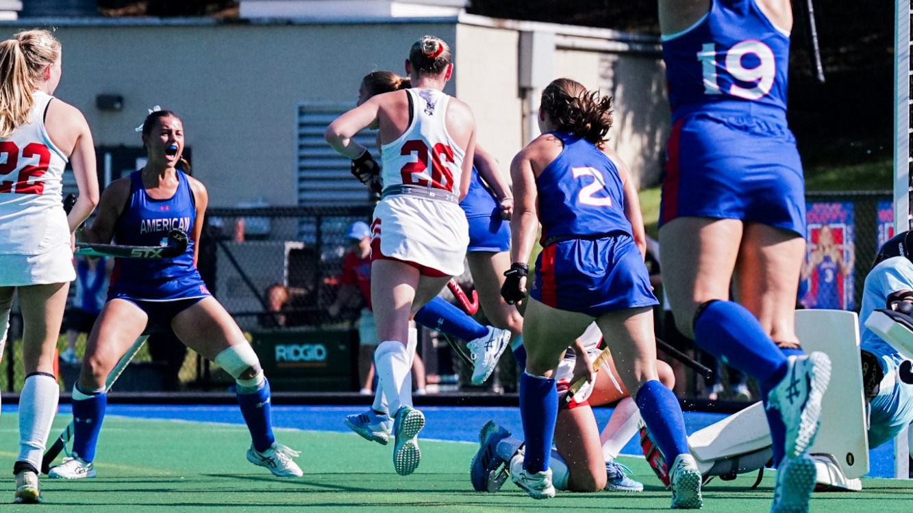 Jordan Reicher celebrating a game-winning goal against Boston University.