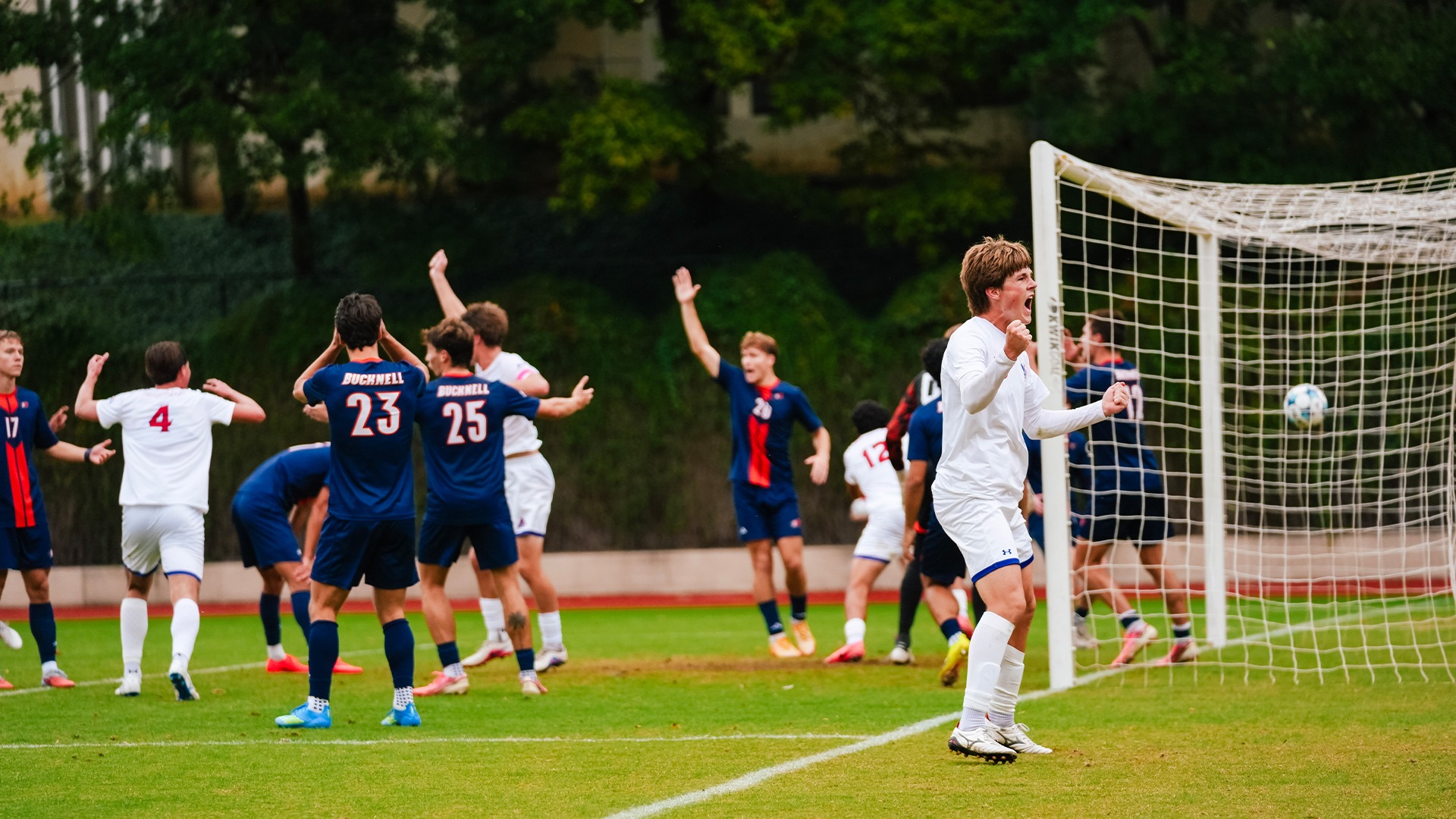 Finn O'Brien celebrating a goal. '