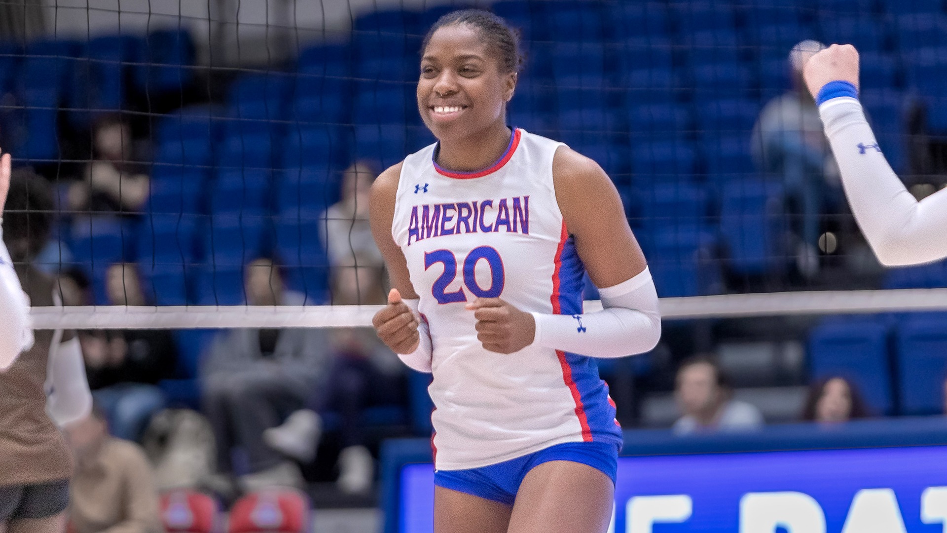 Prinzez Zeck celebrating a point in a volleyball match.