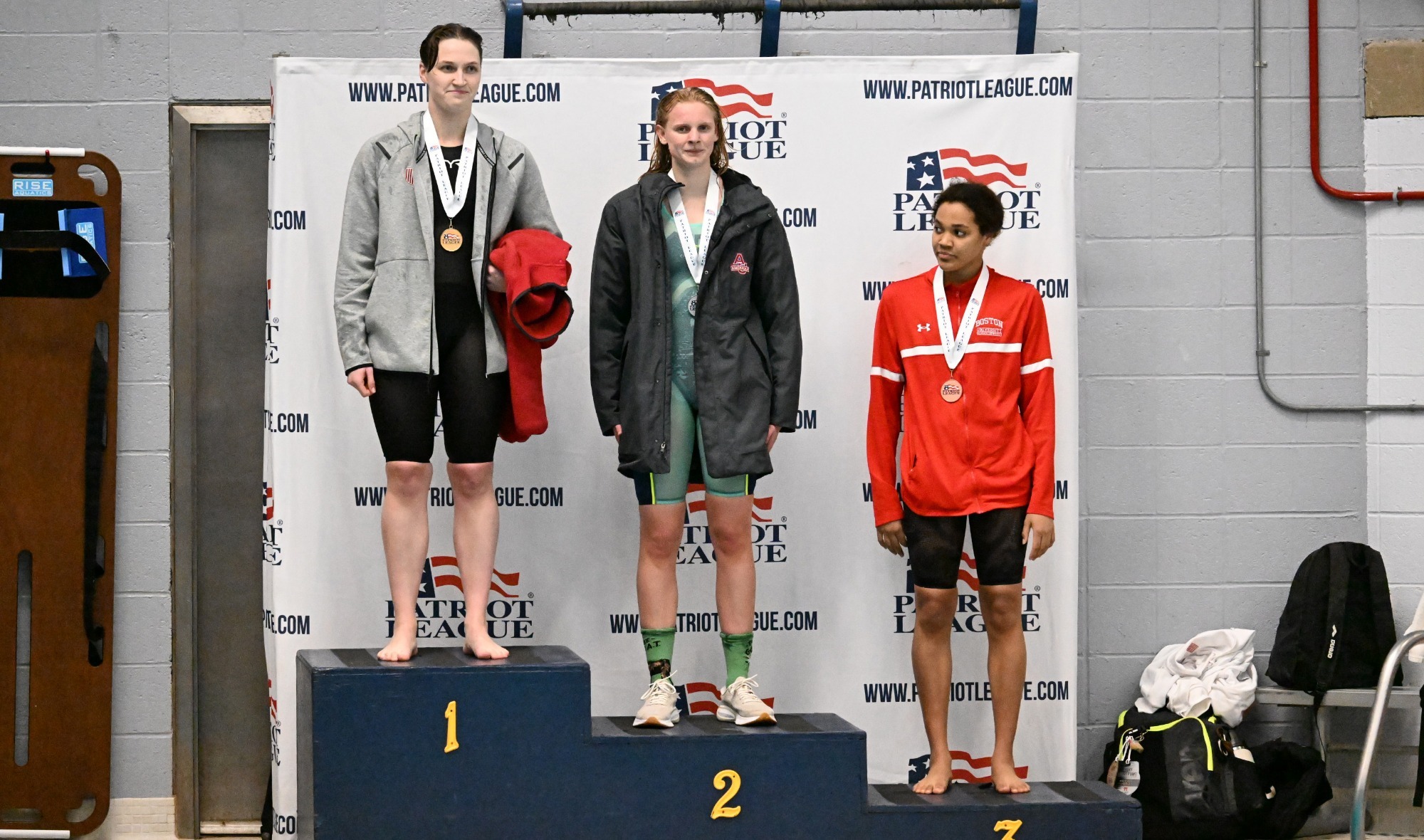 Piper Crosby getting a silver medal for the 200 backstroke at the 2026 PL Championships in swim & dive