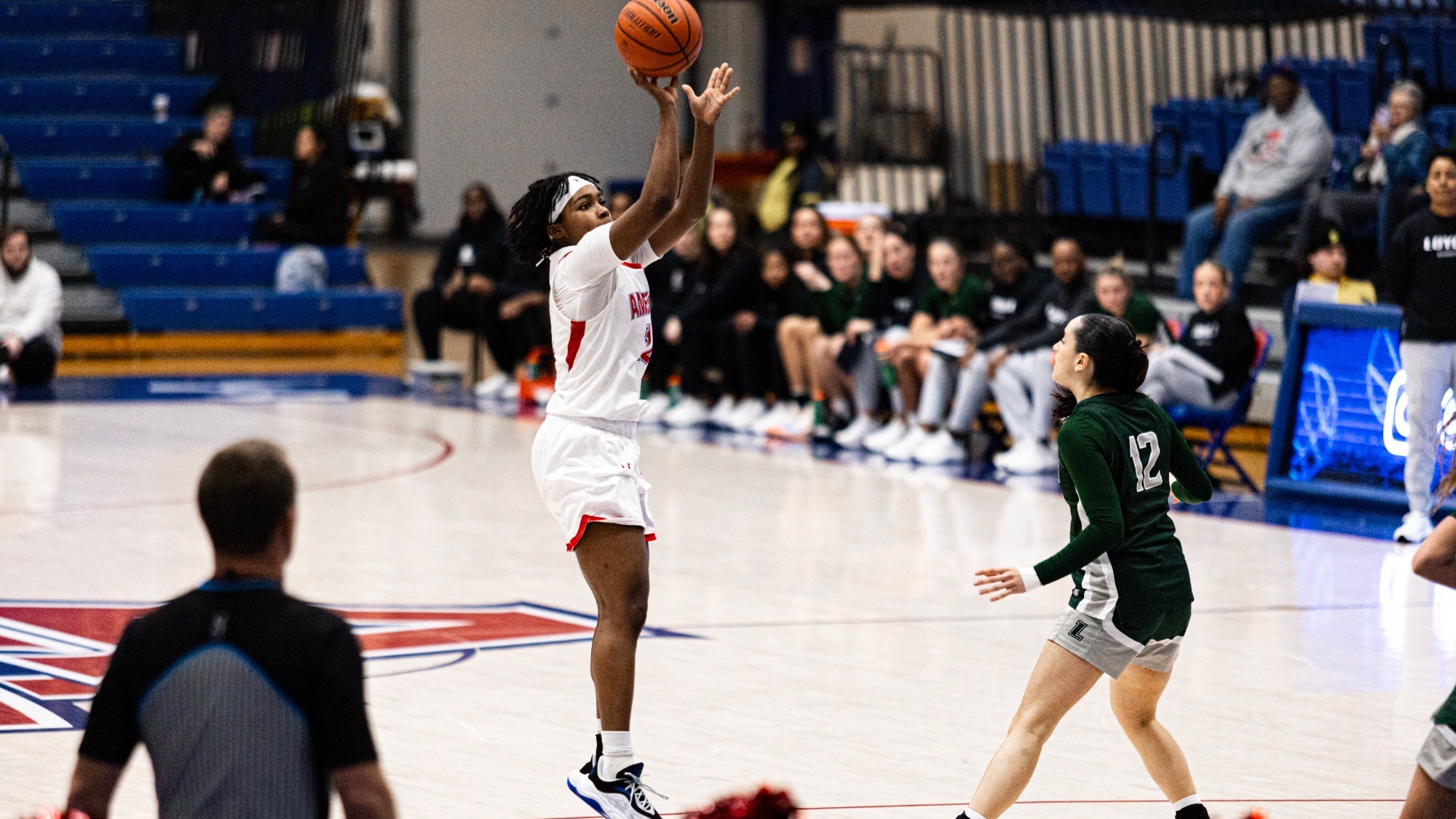 Madisyn Moore-Nicholson taking a mid-range jumper against Loyola.