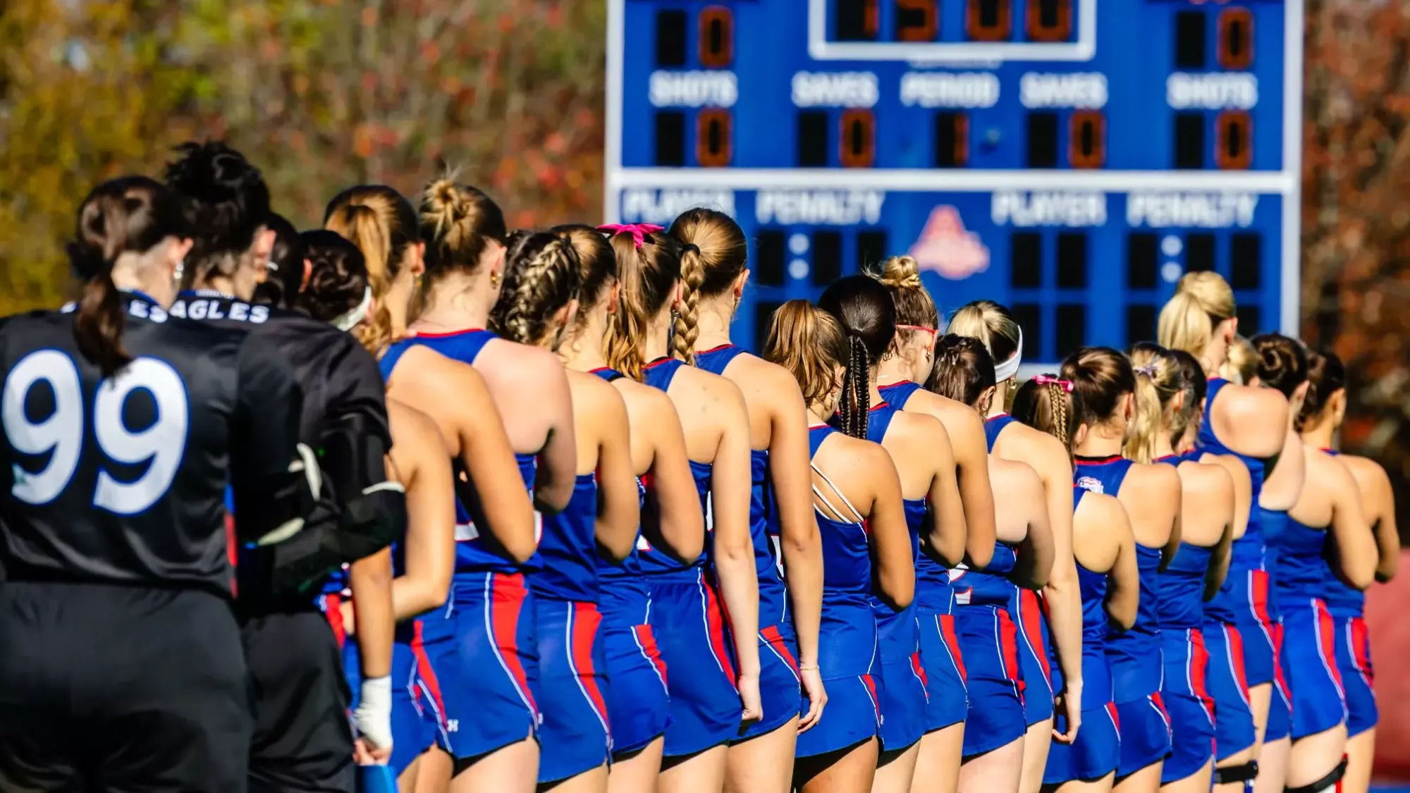 The field hockey team during starting lineups.
