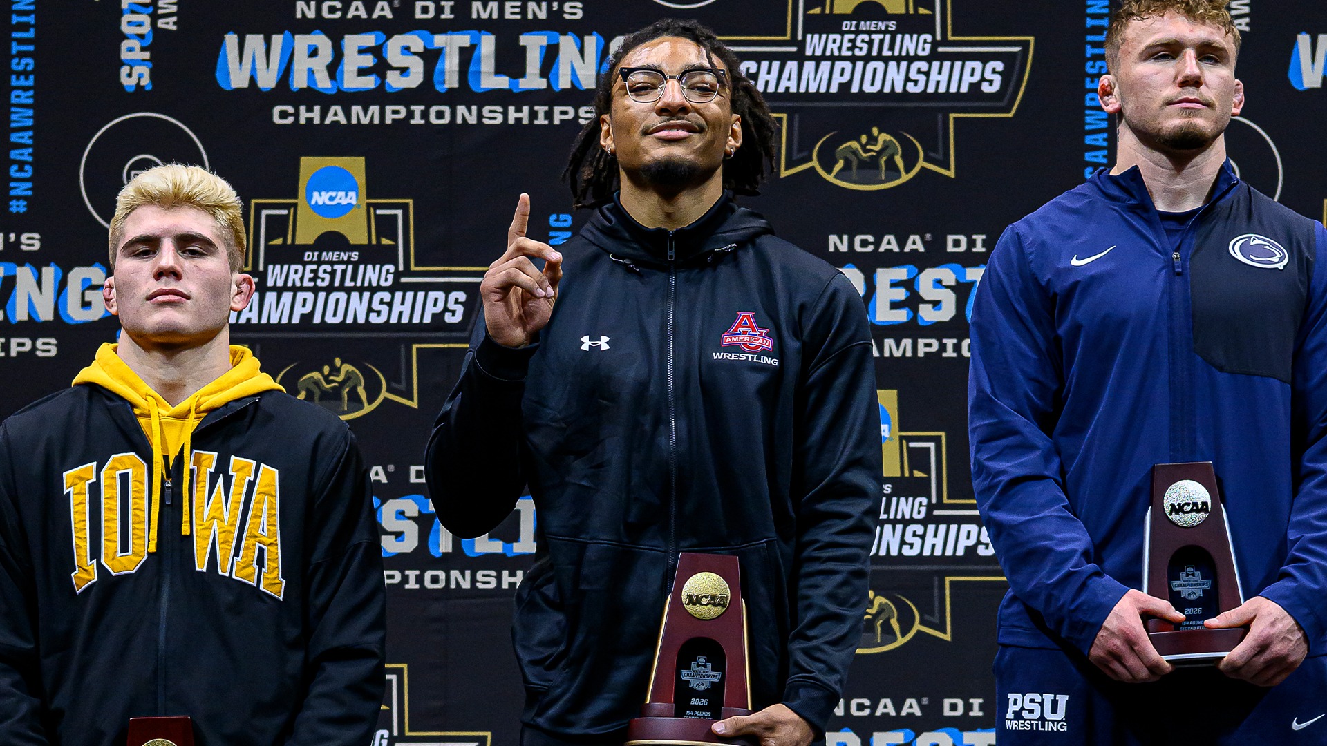 Caleb Campos on the podium at the NCAA Championships, fourth place.