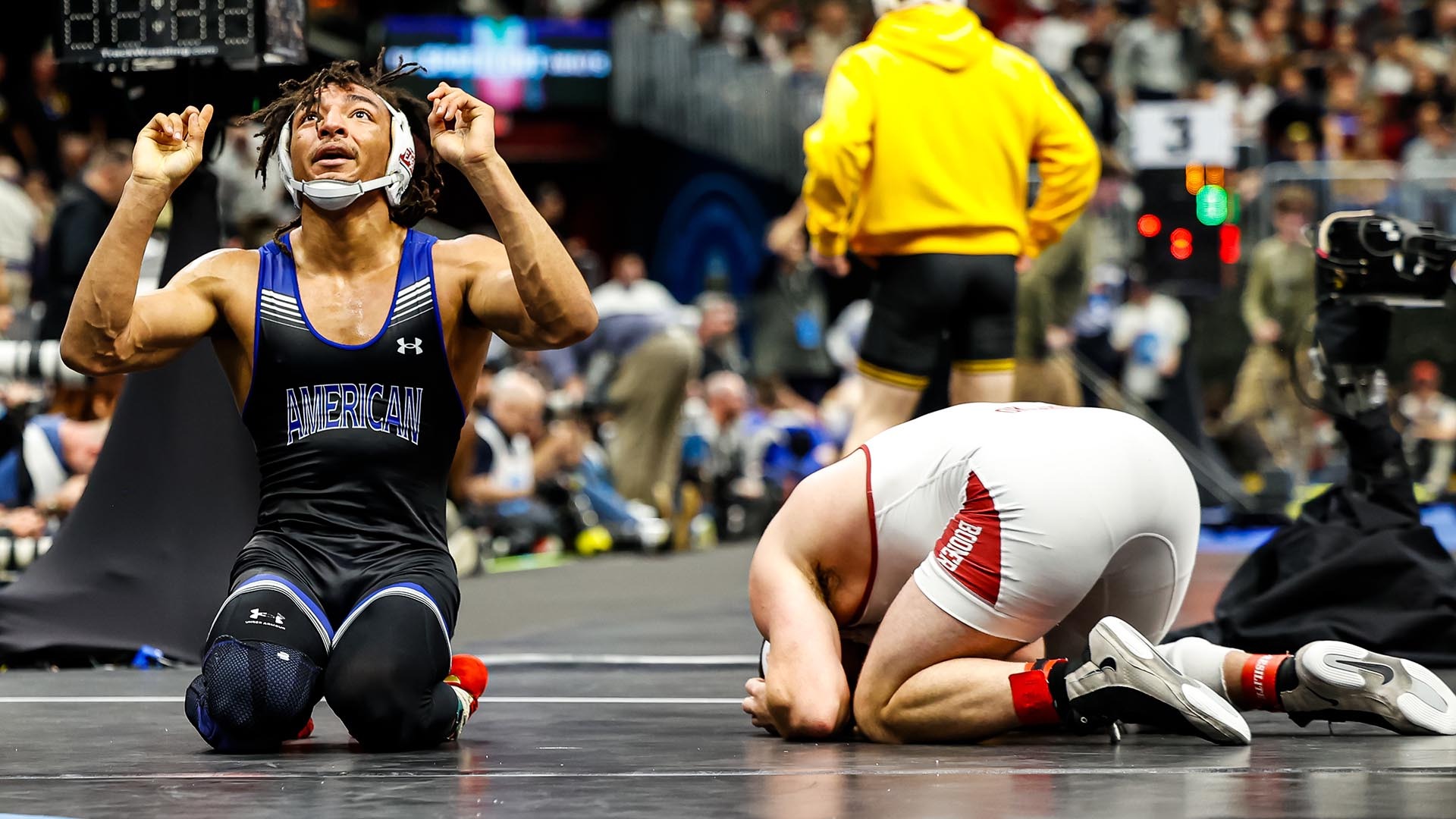 Wrestler Caleb Campos celebrating a big win at the 2026 NCAA Championships