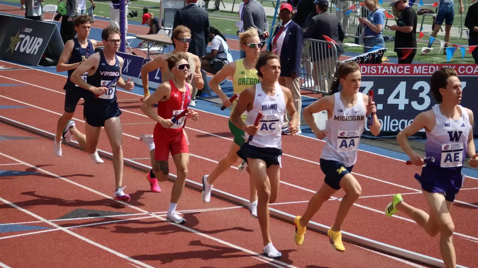 Kaden races the mile leg of the Championship of America DMR at the 2026 Penn Relays