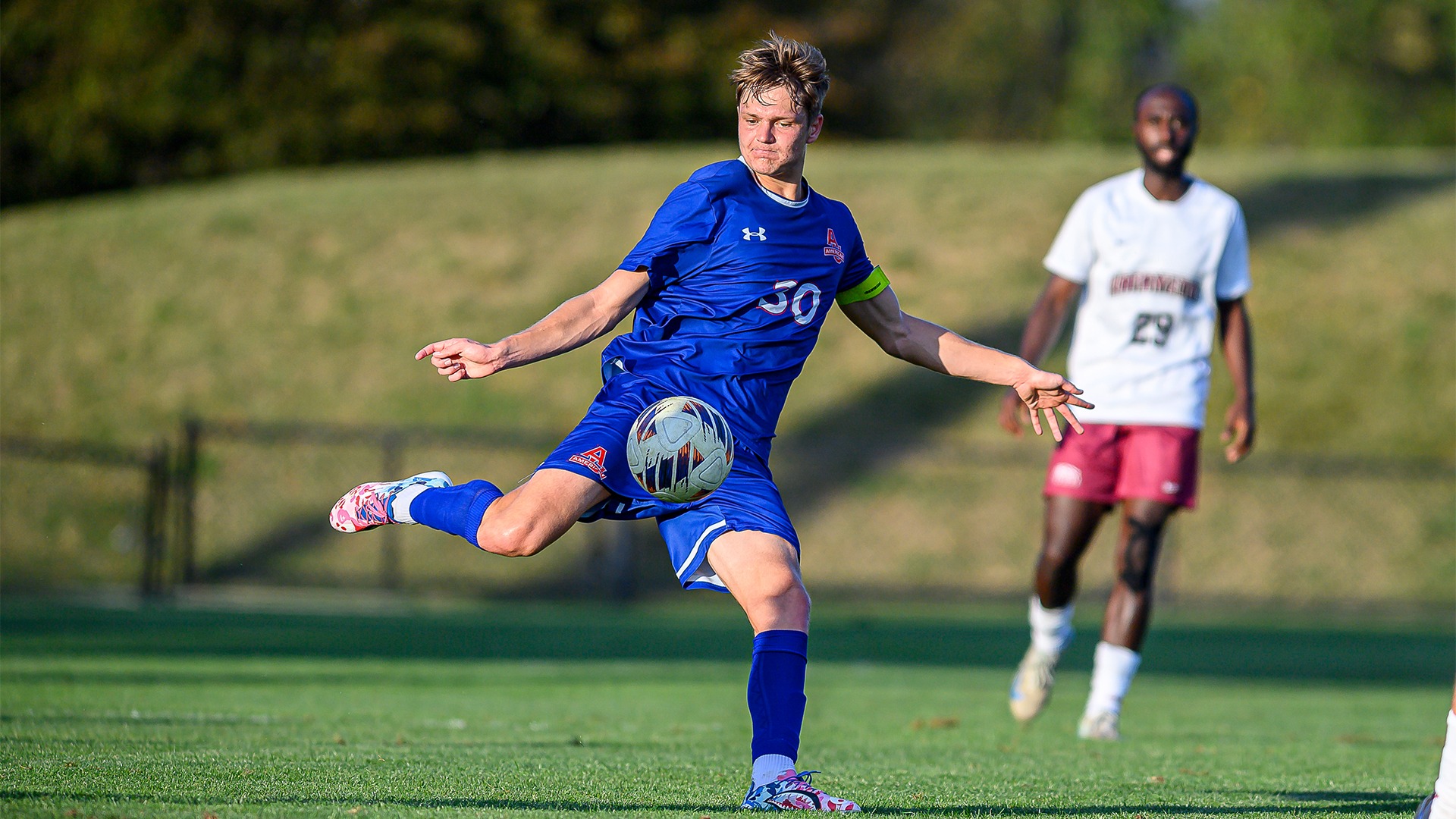 Troy Elgersma kicking the ball in a game against Lafayette. 